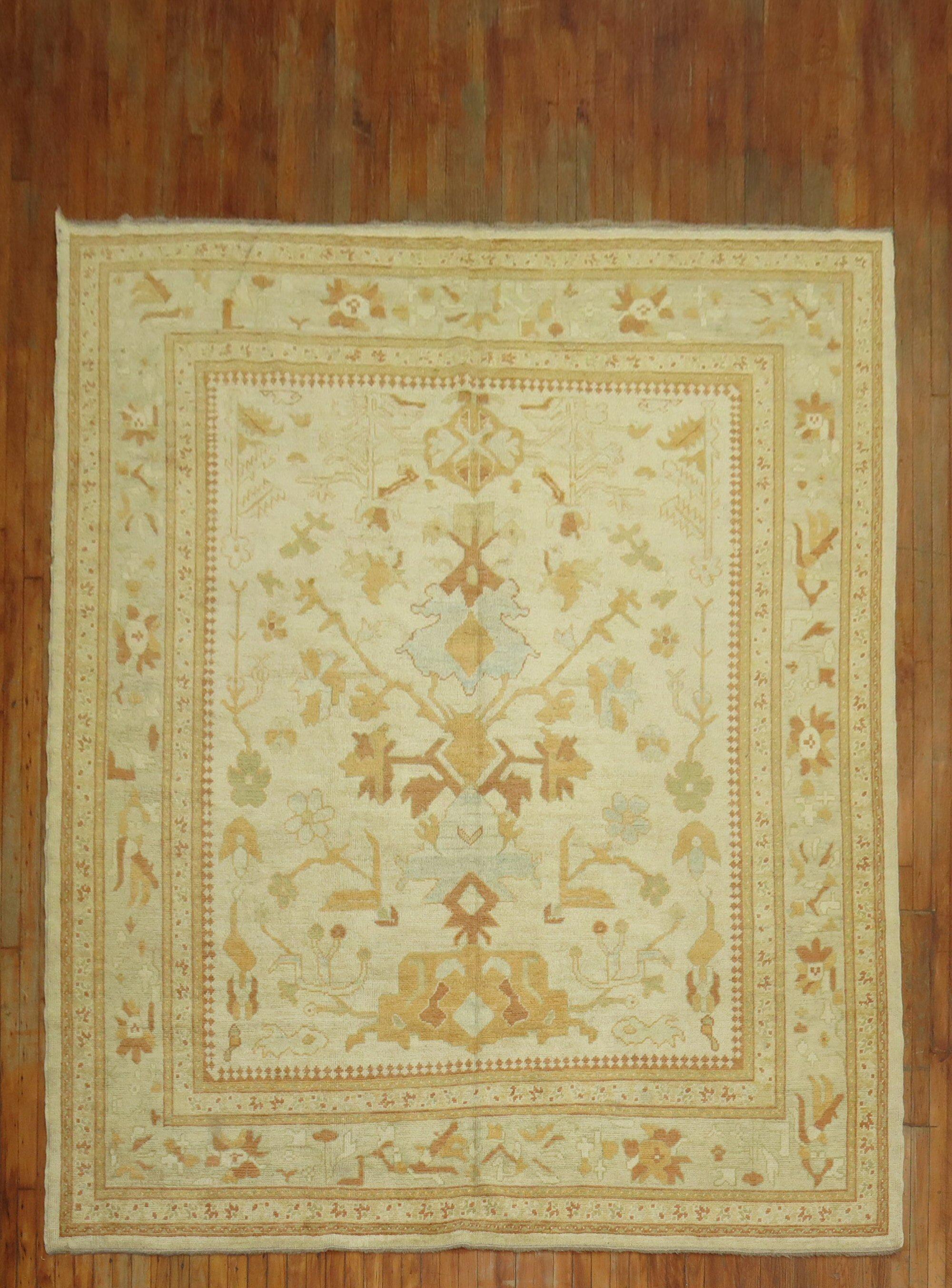 A 21st-century old wool Turkish oushak Room size rug 

Measures: 8'6'' x 10'2''.