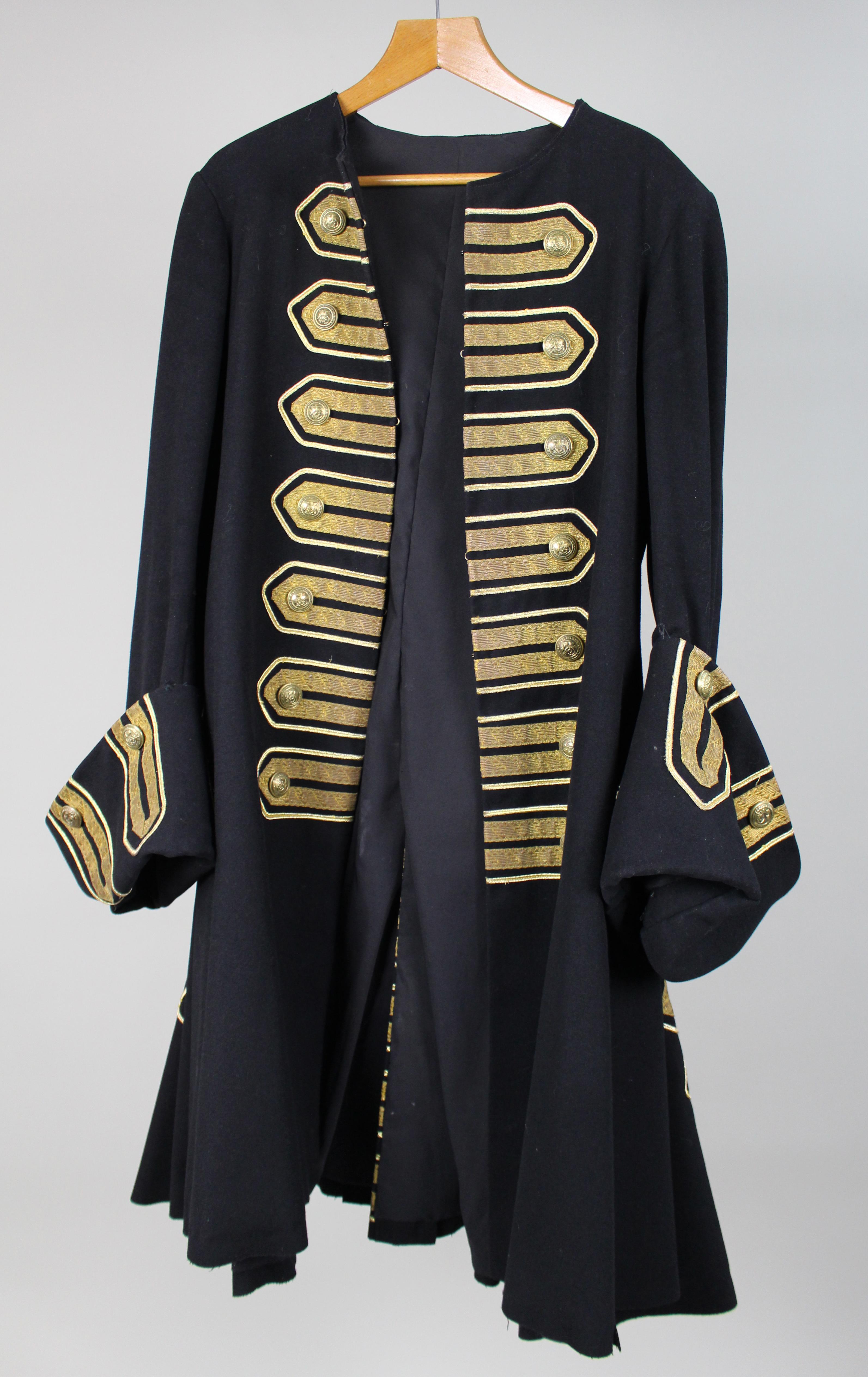Decorative Vintage Ceremonial Wool Coat with Gold Braid Trim, 20th Century

A striking and well-made vintage ceremonial coat, inspired by 18th-century European military and regimental dress. Crafted in black wool and adorned with elaborate gold