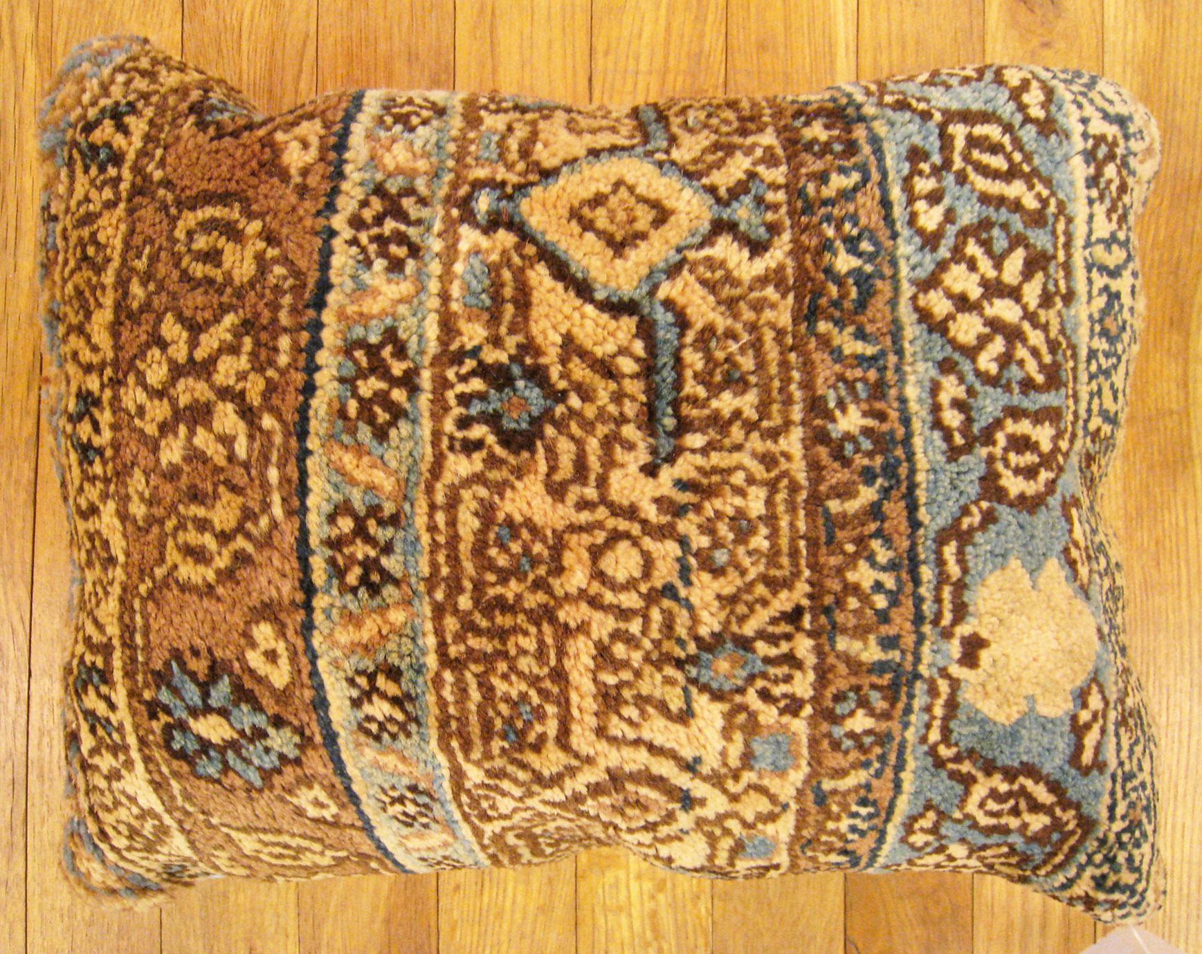 Vintage Persian Pillow; size 1'3” x 1'6”.

A vintage decorative pillow with geometric abstracts motif in a light brown central field, size 1'3” x 1'6”. This lovely decorative pillow features a vintage fabric of a Persian pillow on front and back