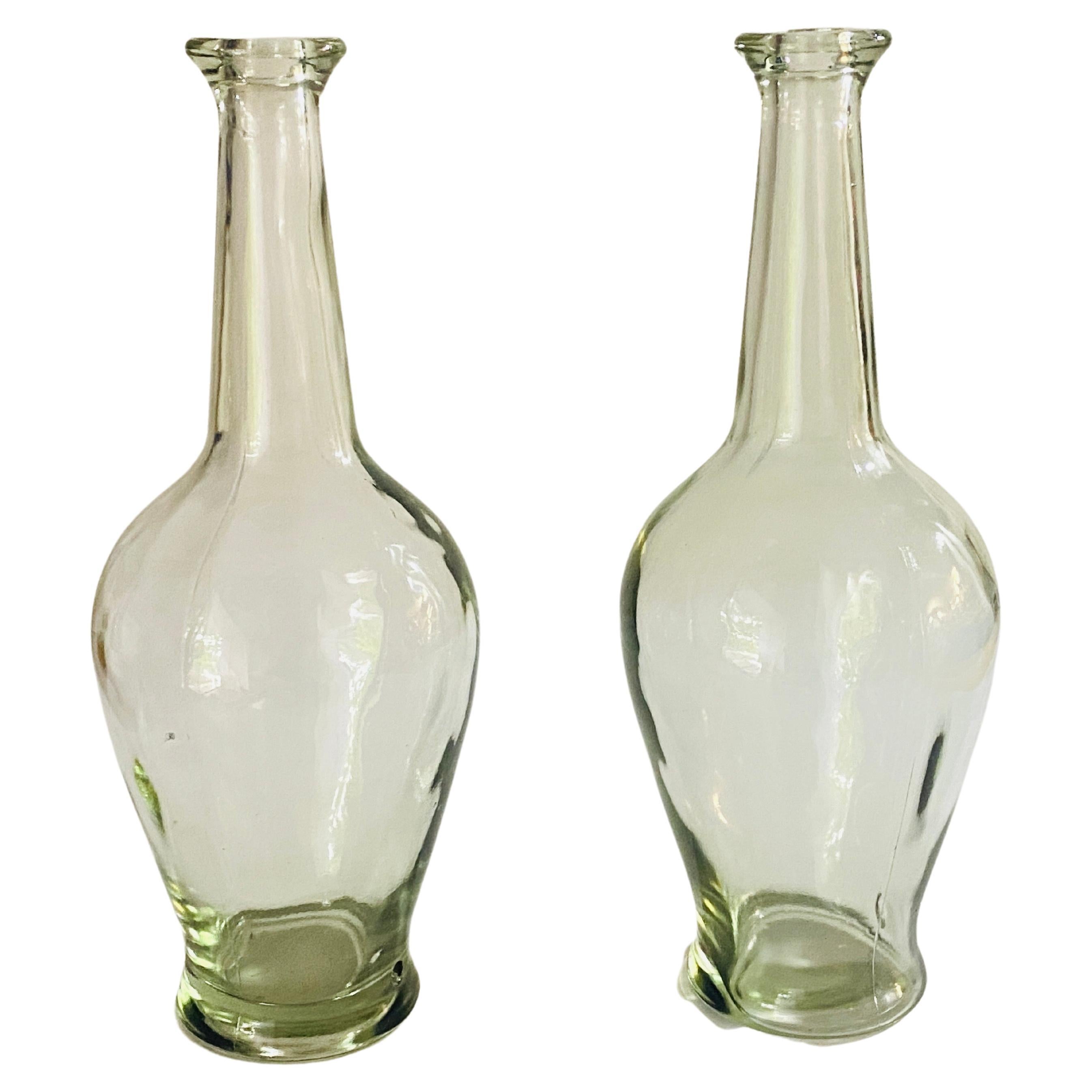 These glass decorative bottles, has been made in France, circa 1960. They are typical French procencial Style shape, in a Transparent color.