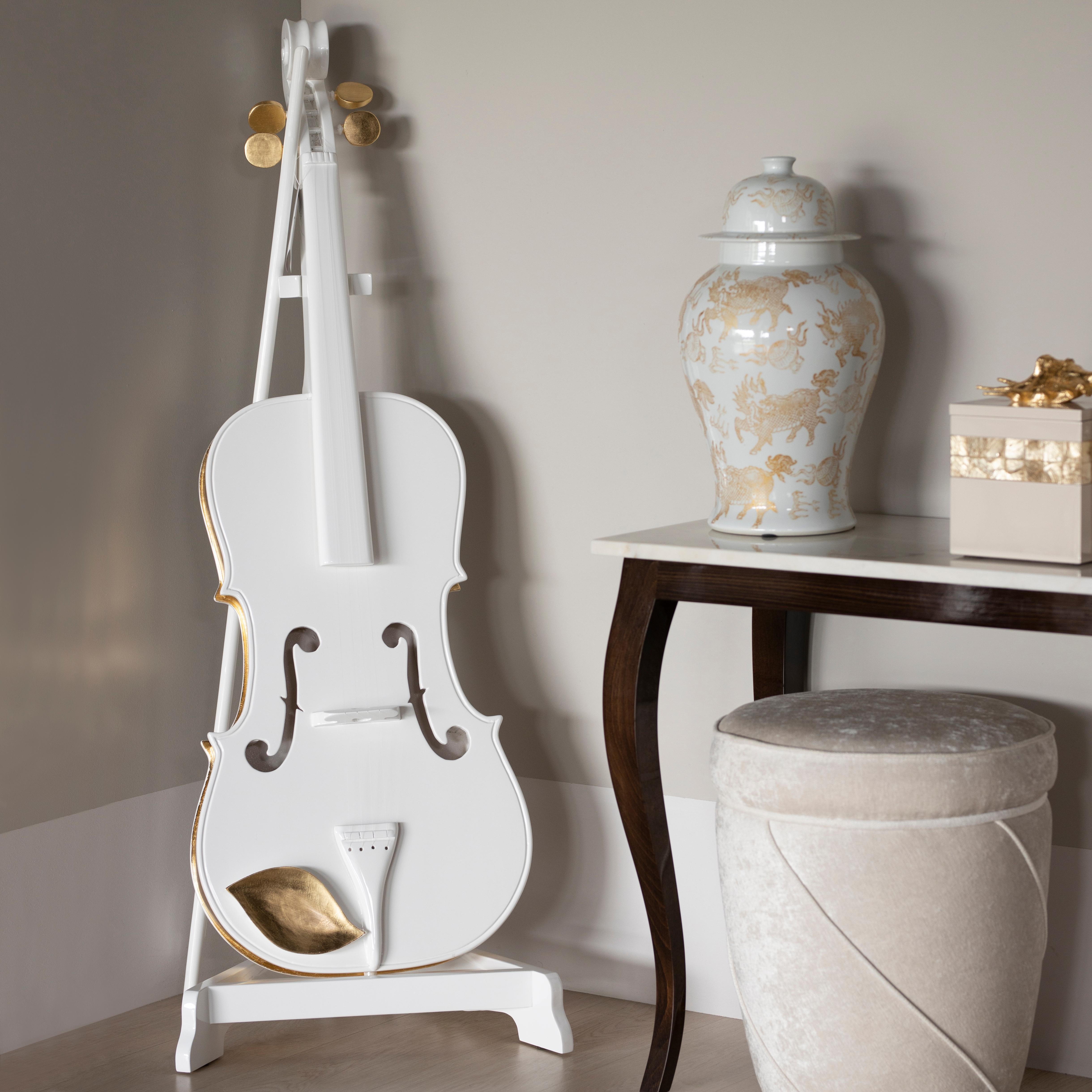 Decorative Brahms Violin, Lusitanus Home Collection, Handcrafted in Portugal - Europe by Lusitanus Home.

Brahms was designed to enhance luxurious interiors. A decorative violin in high-gloss white lacquer with hand-applied gold leaf details,