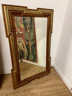 Decorative walnut and parcel gilt wall mirror