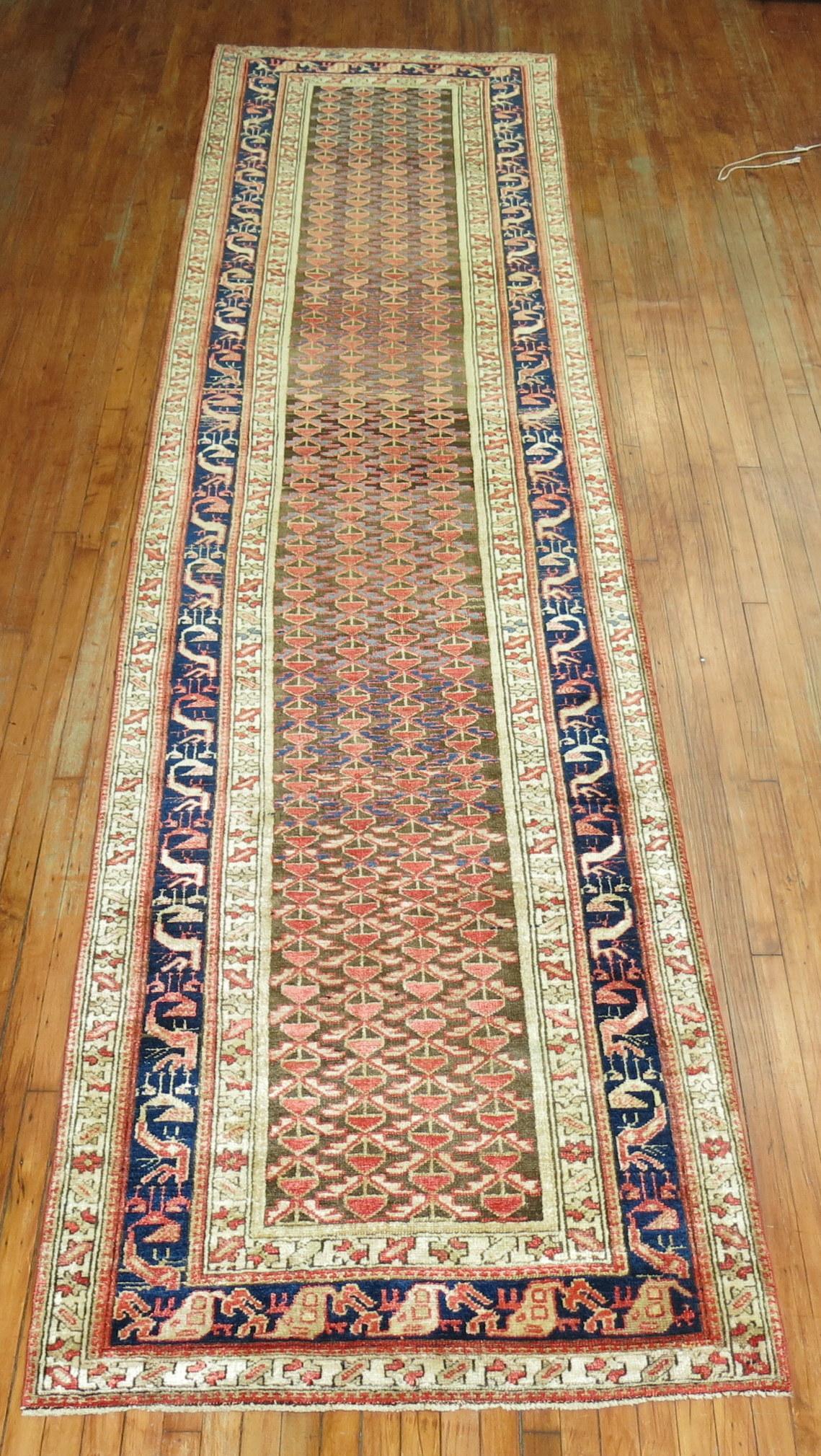 A decorative Persian Malayer wide runner from the 1930's

Size: 3'9” x 15'3”.