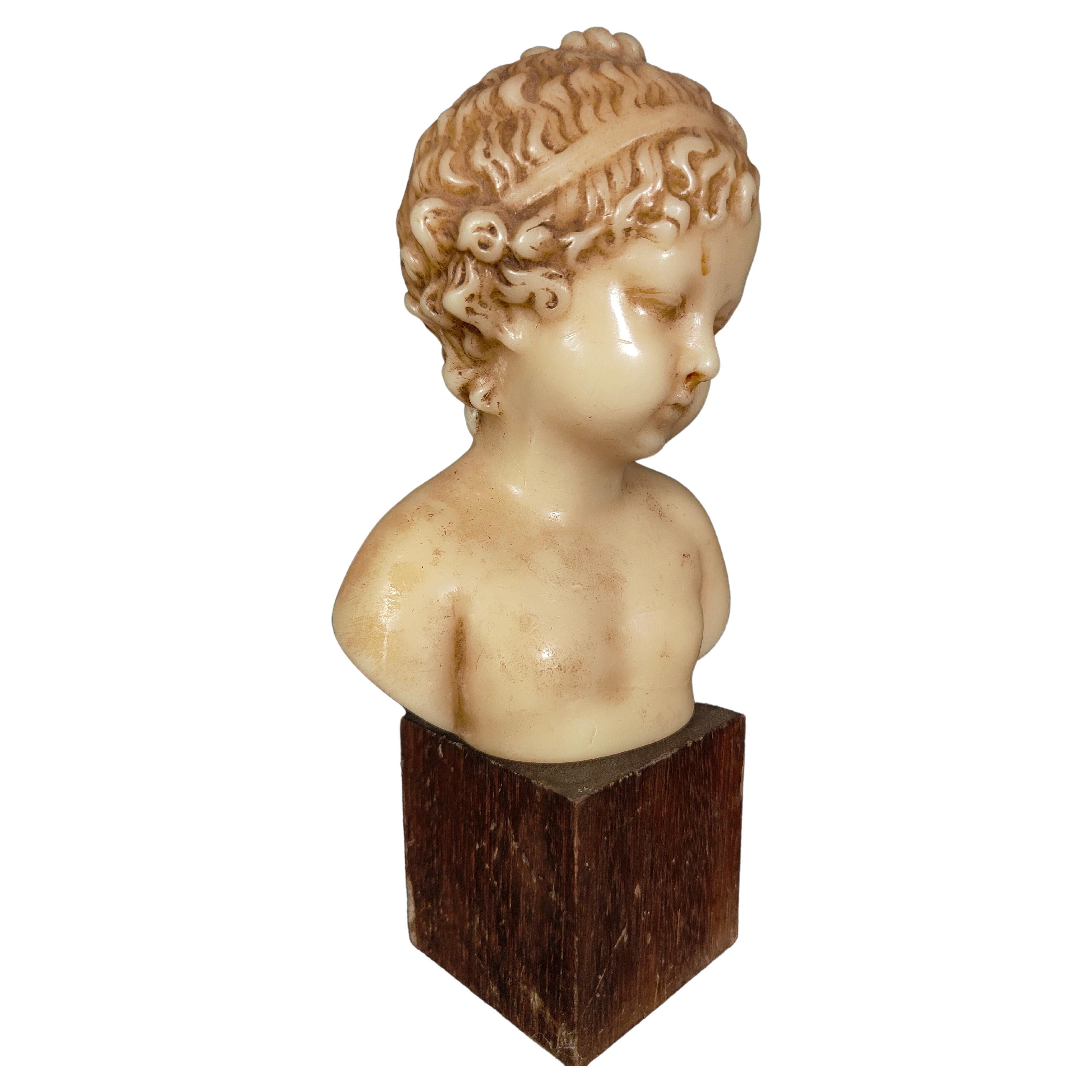 Busto decorativo in cera di bambino del XIX secolo