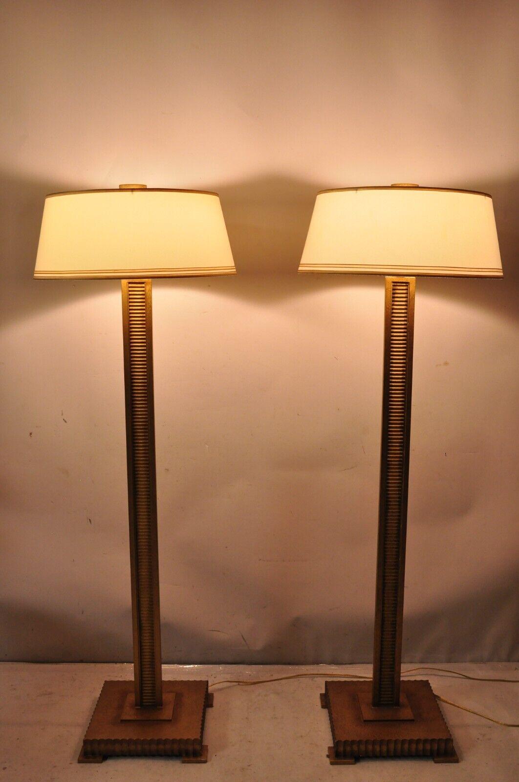 Decorator Fine Art Lamps Gold Gilt  Metal Skyscraper Modern Floor Lamps - a Pair. Item features original round cloth shades, clean modern lines, burnished gold finish, very nice pair. Circa  21st Century. Measurements: 64