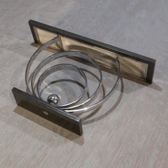 Decorus Ammonite Console Table - Polished Stainless Steel with Black Granite Top
