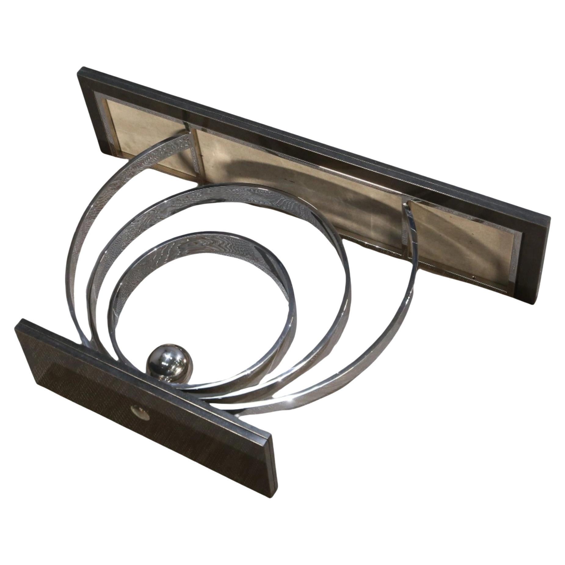 Decorus Ammonite Console Table - Acier inoxydable poli avec plateau en granit noir