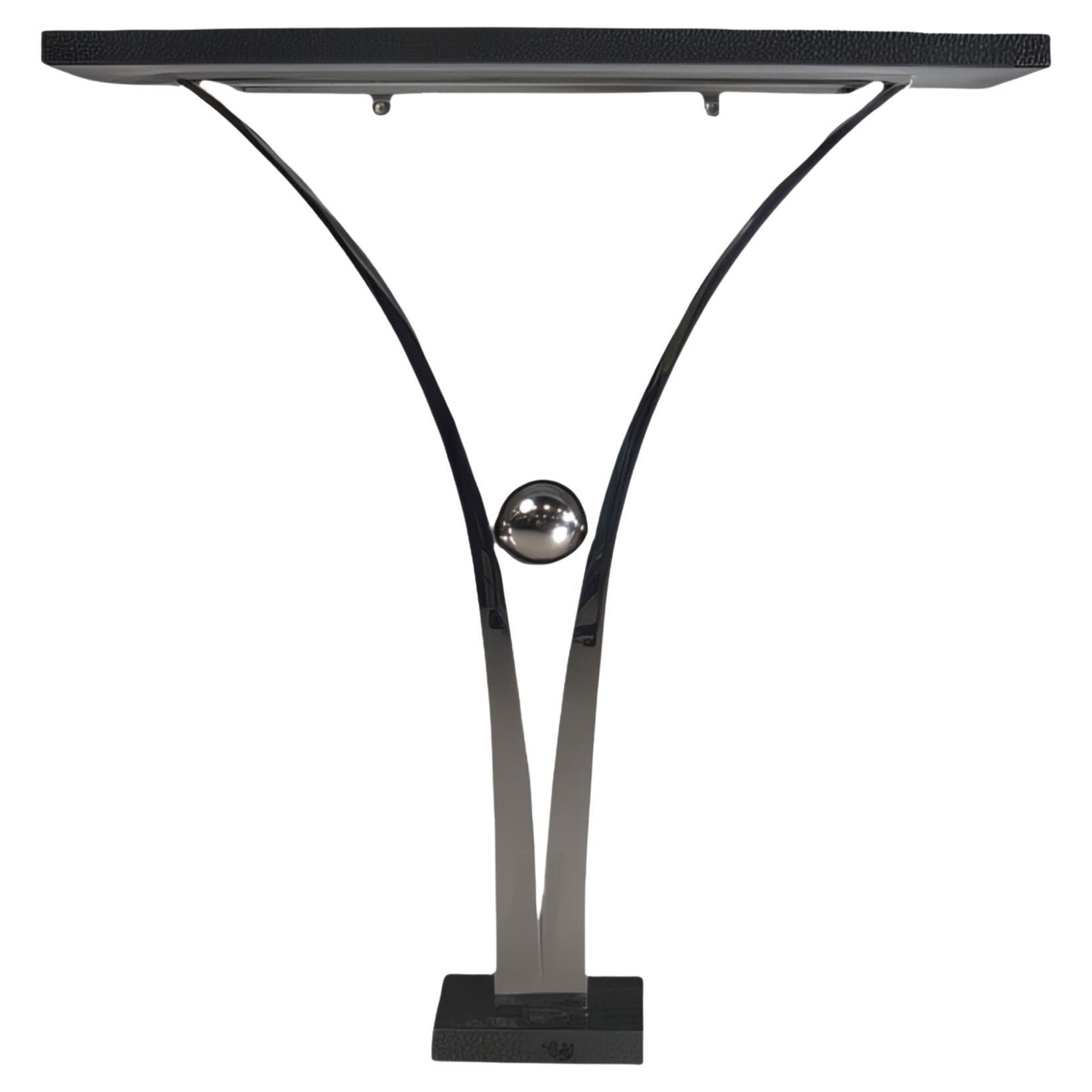 Consola Decorus Viola de acero inoxidable pulido con tapa de granito negro en venta