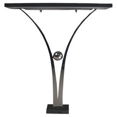 Consola Decorus Viola de acero inoxidable pulido con tapa de granito negro
