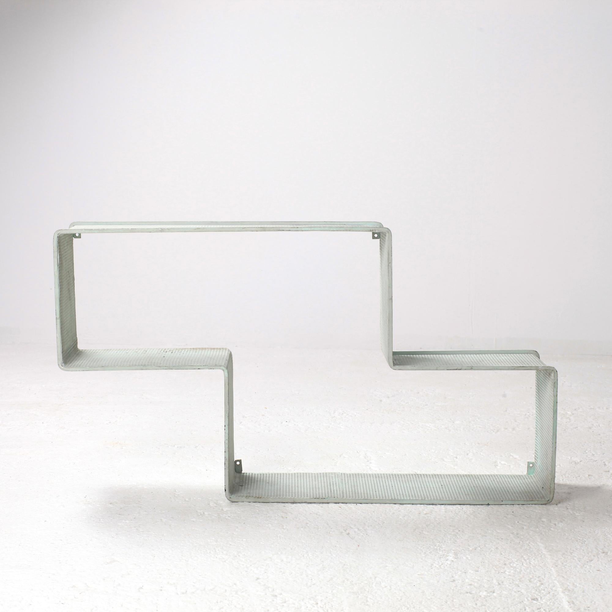Timeless design for this wall shelf by Mathieu Mategot,
Early production 
Perforated Steel, circa 1950, France