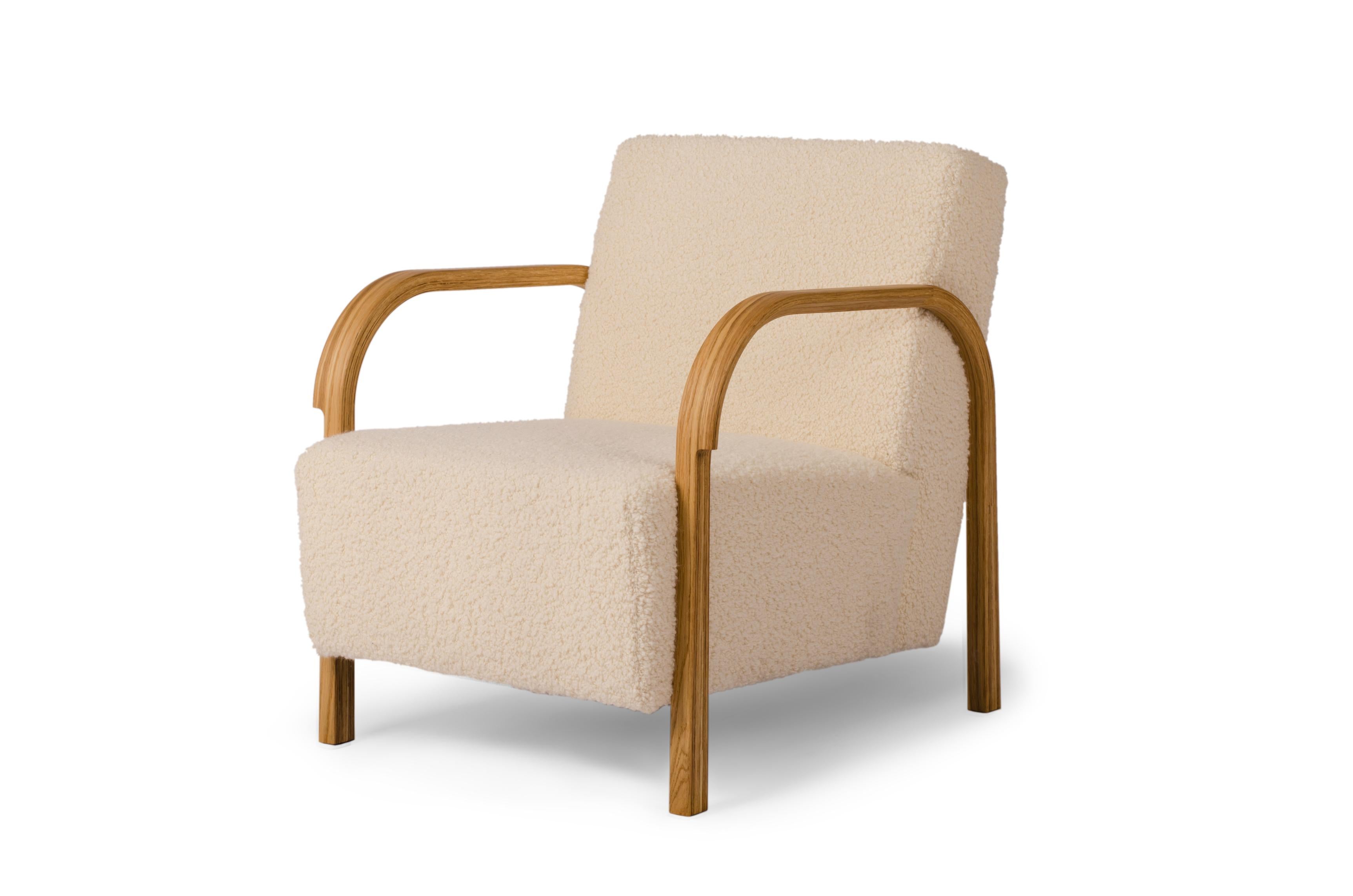 Dedar/Artemidor Arch lounge chair by Mazo Design
Dimensions: W 69 x D 79 x H 76 cm
Materials: Oak, Sheepskin

With the new ARCH collection, mazo forges new paths with their forward-looking modernism. The series is a tribute to the renowned