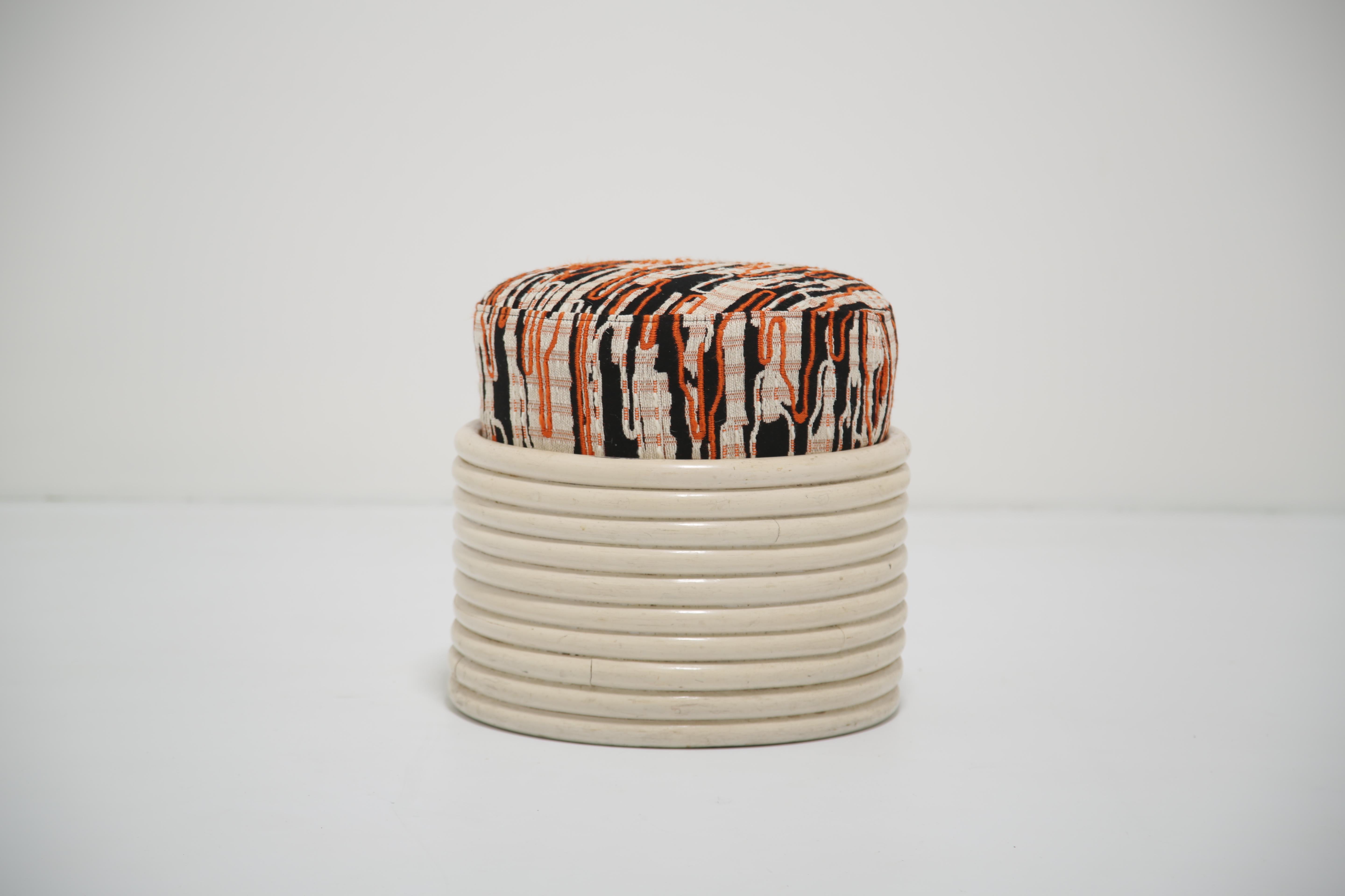 We have taken a very simple but cool mid-century bamboo stool and covered it in Ani Albers re editioned fabric by Dedar. This fabric certainly ranks among the more beautiful yet expensive fabrics out there and we feel makes for a really funky and