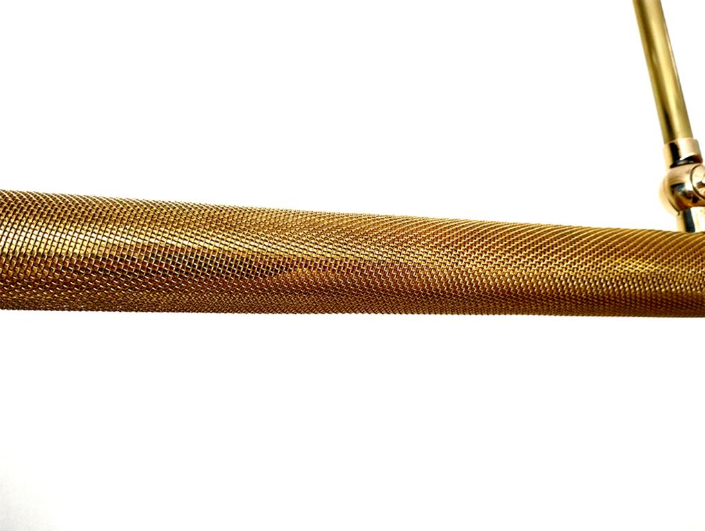 Solid brass tube seamlessly wrapped with brass mesh. Original assembling technique developed by our artisans.
Finished and assembled by hand. 
Dedon can be self adjusted horizontally. Fixed version is available on request. 

We can make this piece