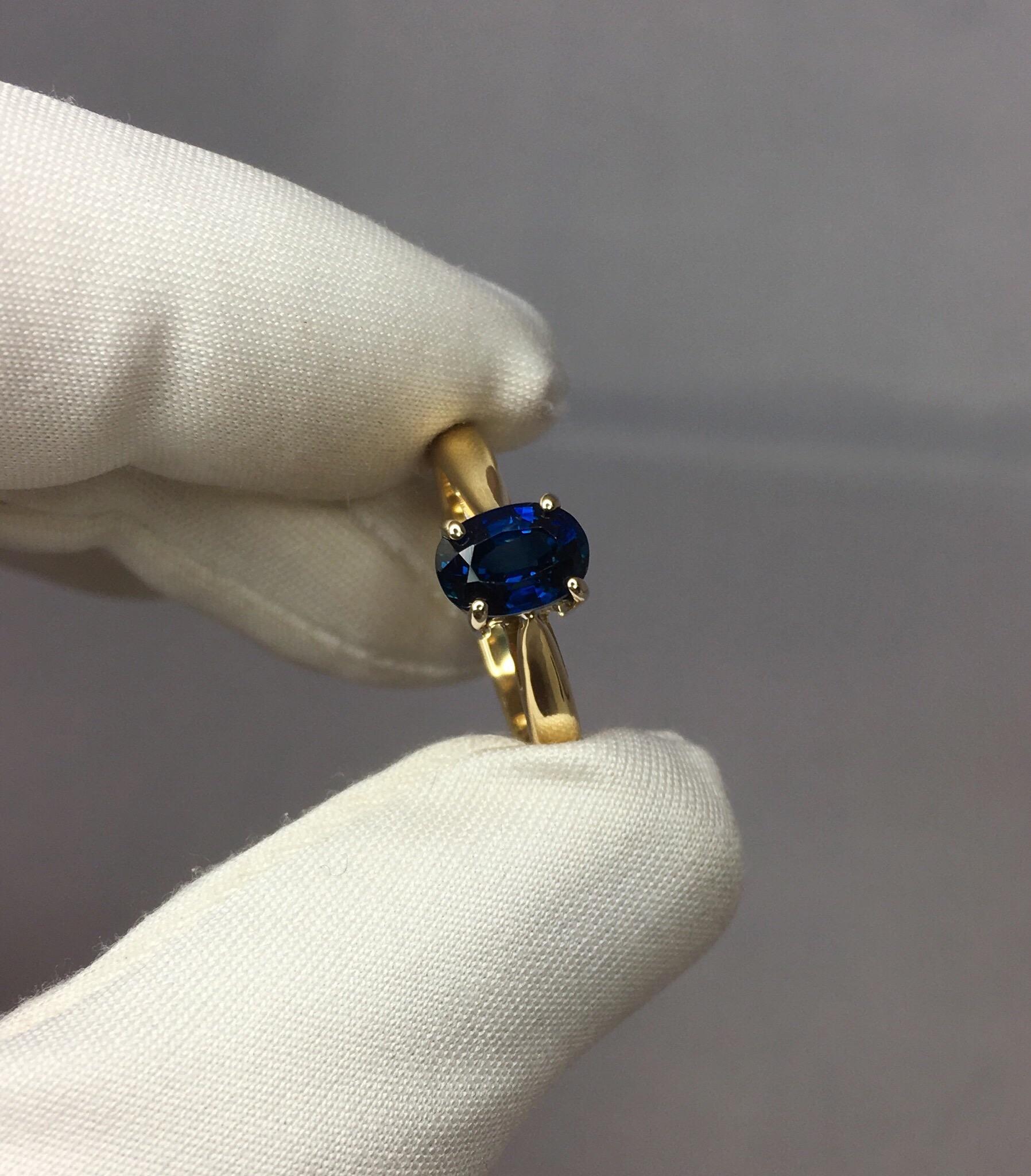 Oval Cut Deep Blue 1.25 Carat Sapphire Solitaire 18 Karat Mixed Gold Solitaire Ring