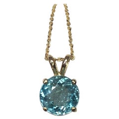 Deep Blue 1.70 Carat Round Cut Aquamarine 14 Karat Yellow Gold Pendant Necklace