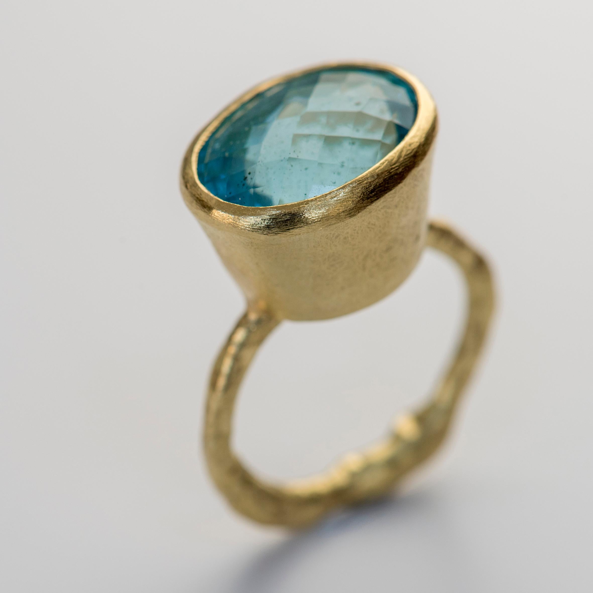 18k yellow gold organic textured cocktail ring with pineapple cut aquamarine, a gorgeous aqua blue colour, 11.28 carats, 16x14mm oval.

Handmade by internationally renowned goldsmith Disa Allsopp. Disa is inspired by ancient cultures such as the