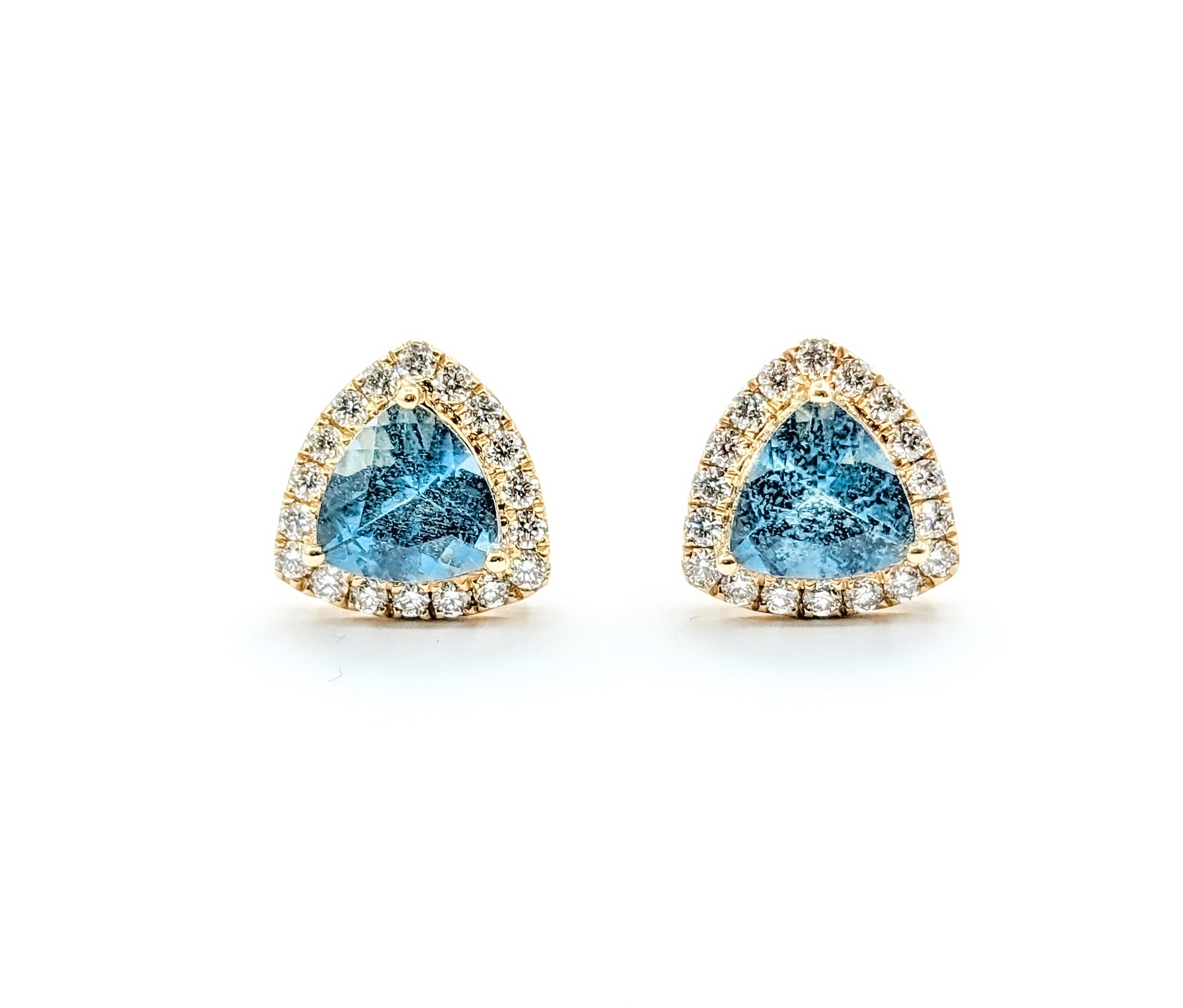 Deep Blue Aquamarine & Diamond Stud Earrings

Introducing these exquisite earrings, meticulously crafted in 14k yellow gold, adorned with .30ctw of dazzling round diamonds. The diamonds, known for their mesmerizing sparkle, possess SI1 clarity and G