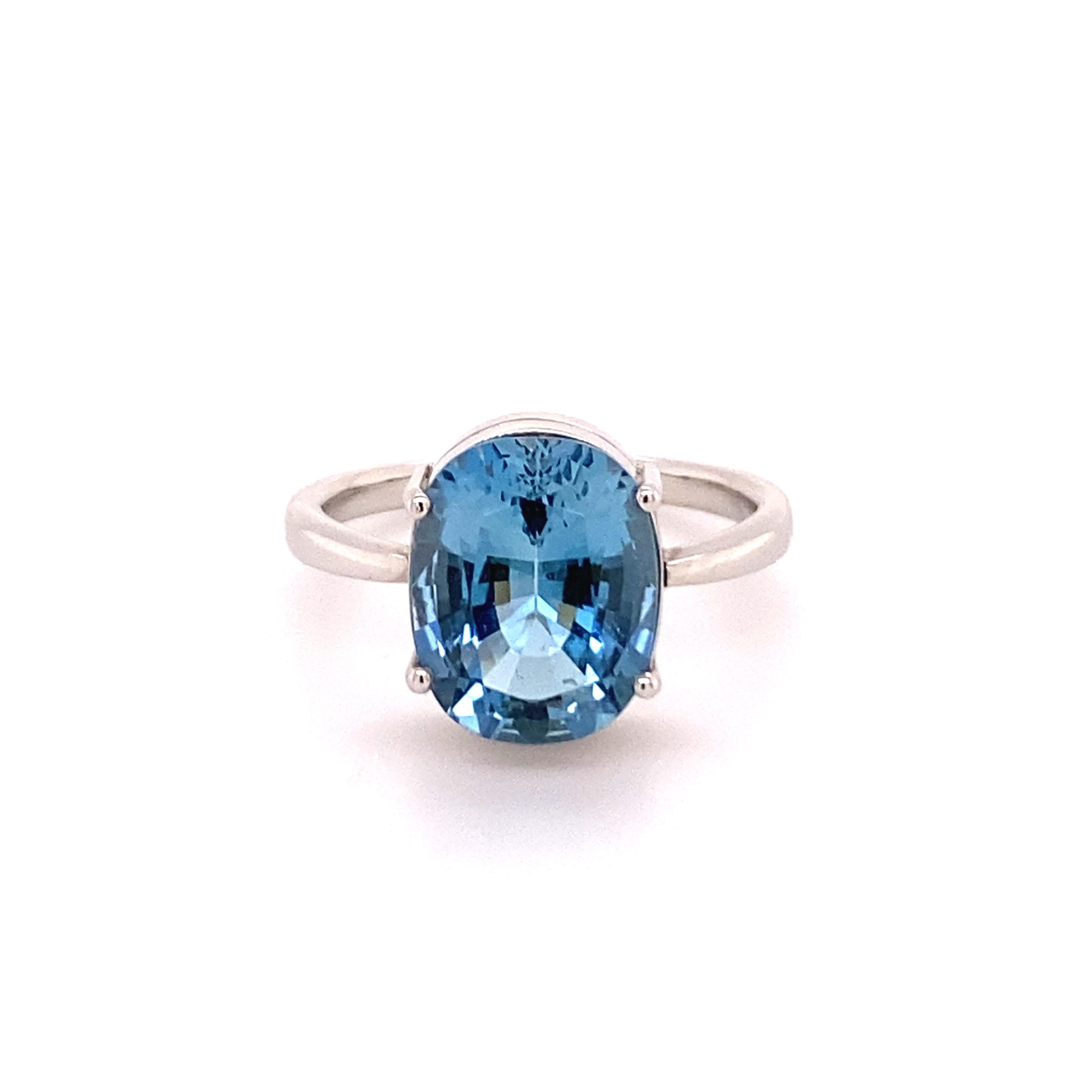 The colour of Aquamarines can vary from a light blue to an intense sea blue, our stone lives up to its name and truly immerses you.
The oval cut stone weighs approximate 6 ct and is set in a solid setting with delicately worked prongs. 
The small