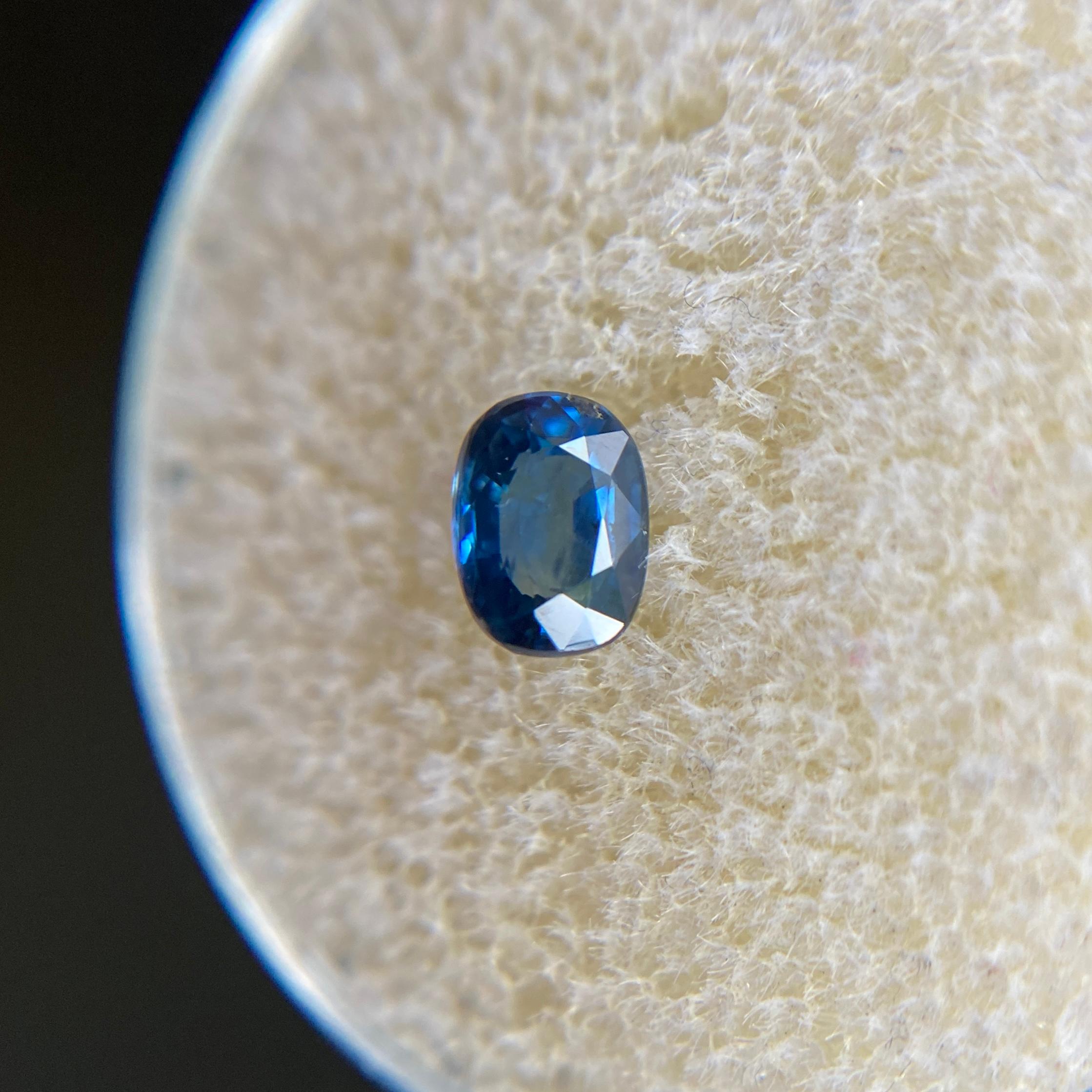 Natural Blue Australian Sapphire Gemstone.

0.56 Carat with a beautiful blue colour and good clarity, a clean stone with only some small natural inclusions visible when looking closely. Also has an excellent cushion cut and polish to show great