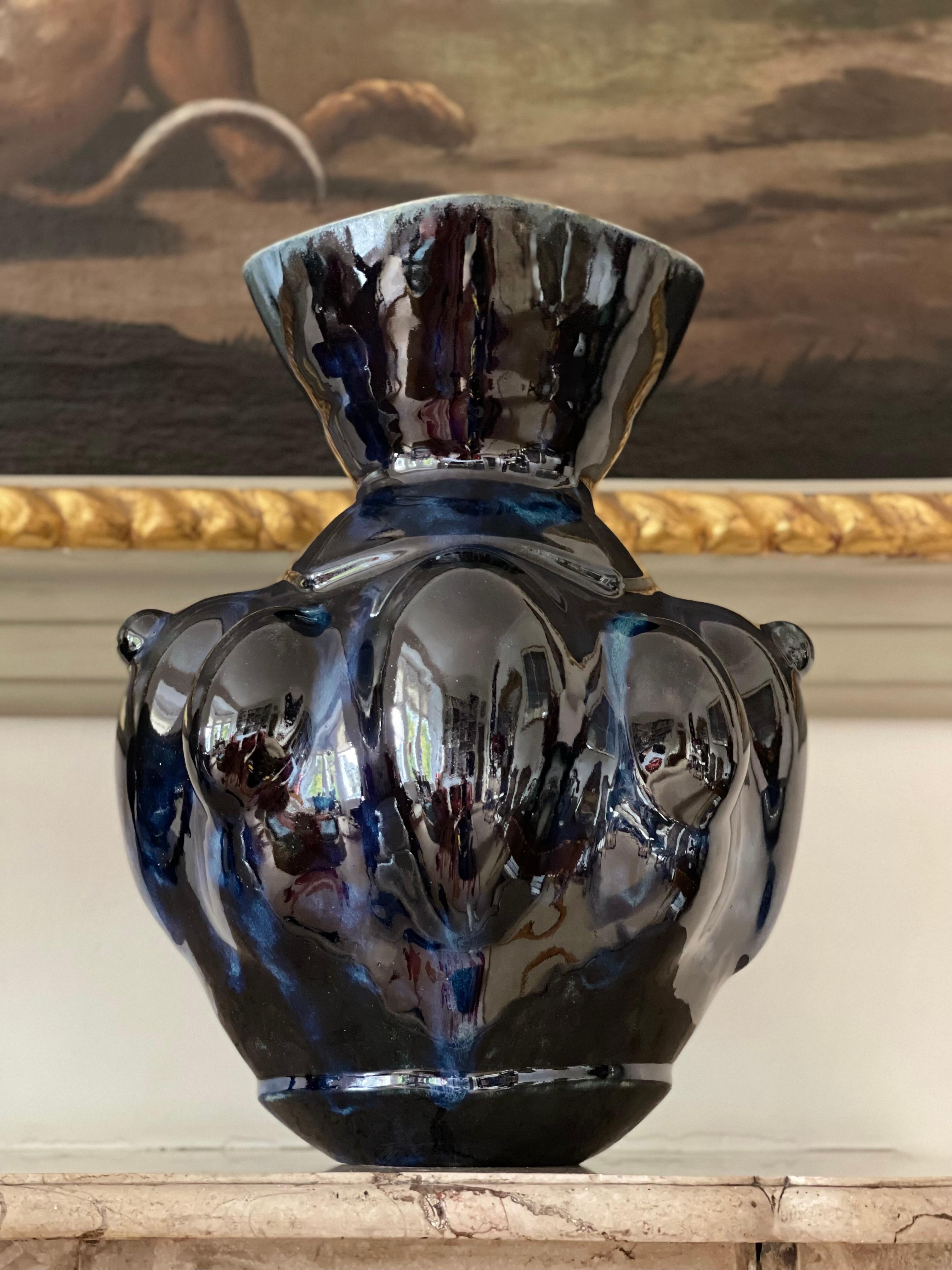 Violante Lodolo D'Oria, deep blue globule vase, 2021, glazed stoneware. W26cm x H36cm

New stunning piece created by ceramic artist Violante Lodolo d' Oria. The layering of different glazes creates shimmering and ever-changing effects under