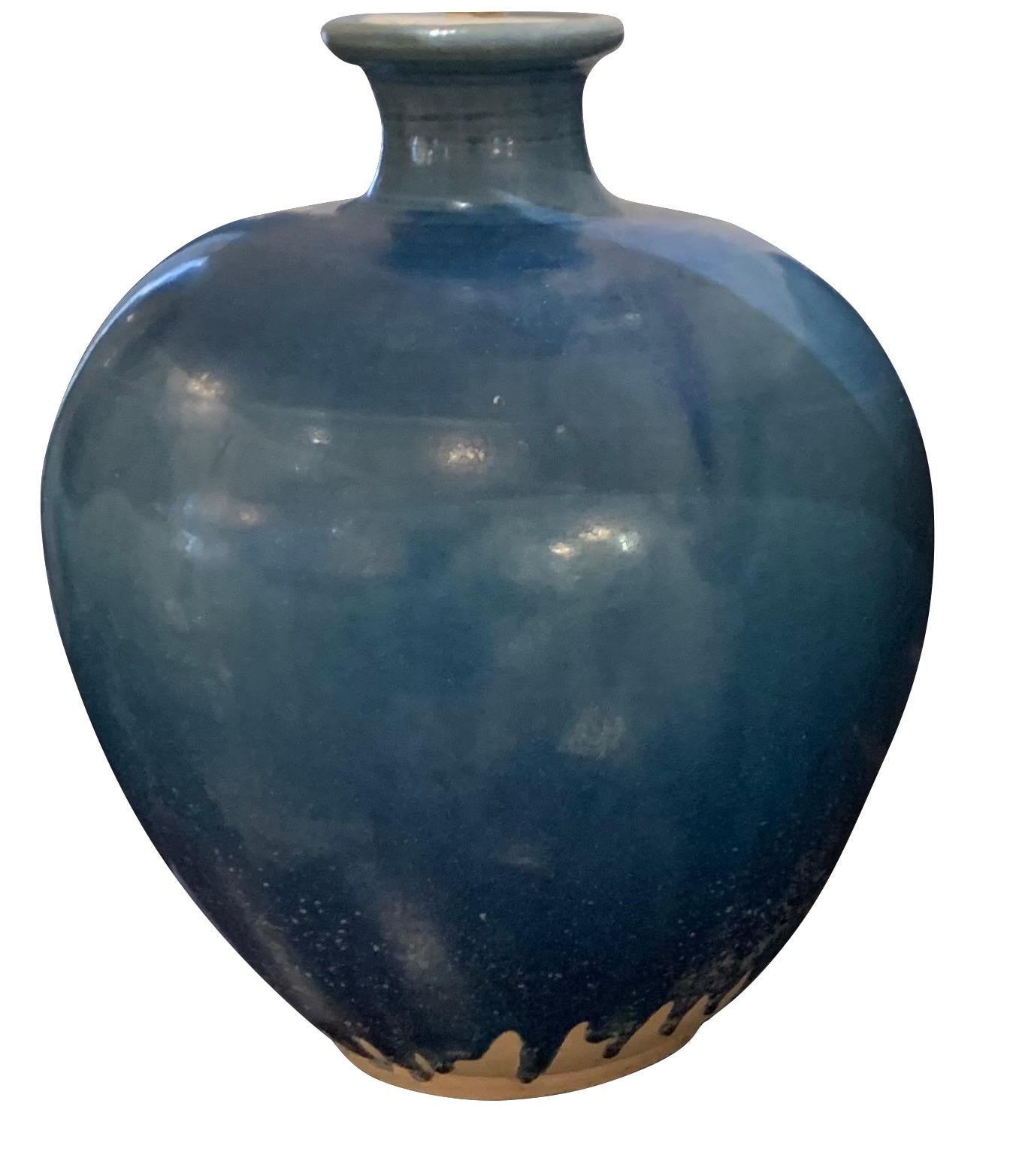 Contemporary Chinese pair deep blue glazed lamps with ginger jar shape.
New Belgian linen shades.
Base 9