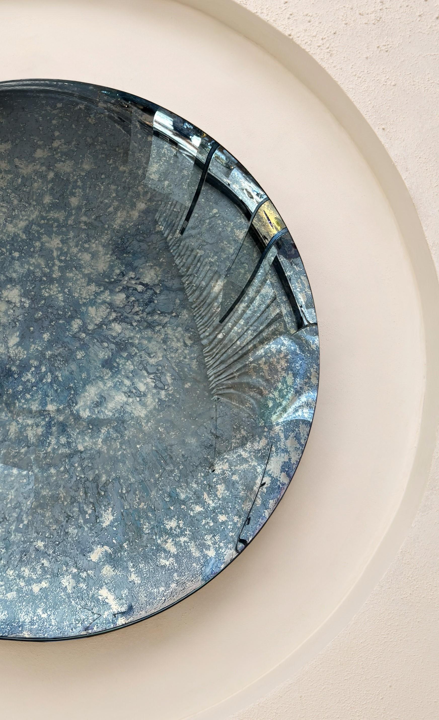 Convex Mixed Technique Mirror.
Ø97 cm  Depth: 7 cm  Thickness: 4 mm 
Colour: Multicolor  Hanger: Brass


HOMA's convex mirrors merges antique mirroring
techniques with modern aesthetics. Through experiments with the chemistry of the mirroring
