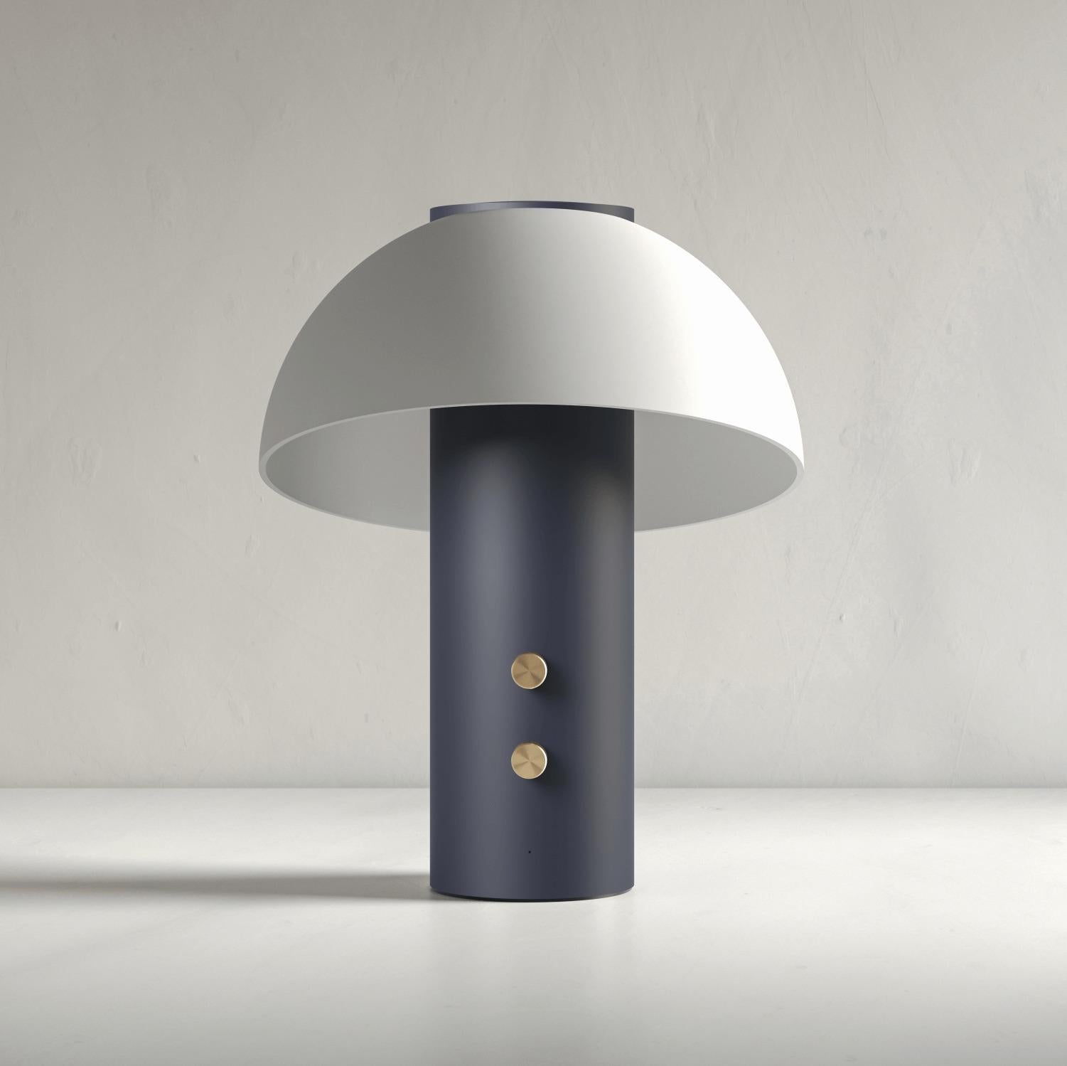 Deep Blue Piccolo Speaker Lamp by JAUNE STUDIO
Dimensions: D 23 x H 30 cm
Materials: Aluminum body, brass rotative knobs, lacquered painting. Opal hand blown glass lampshade. 

Lighting : Variable LED lighting 1800 to 2700K - 0 to 1000