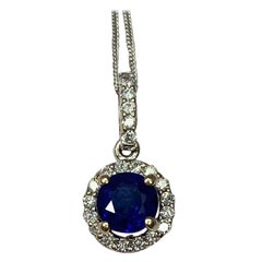 Deep Blue Sapphire and Diamond Round Cut 18 Karat Gold Halo Cluster Pendant