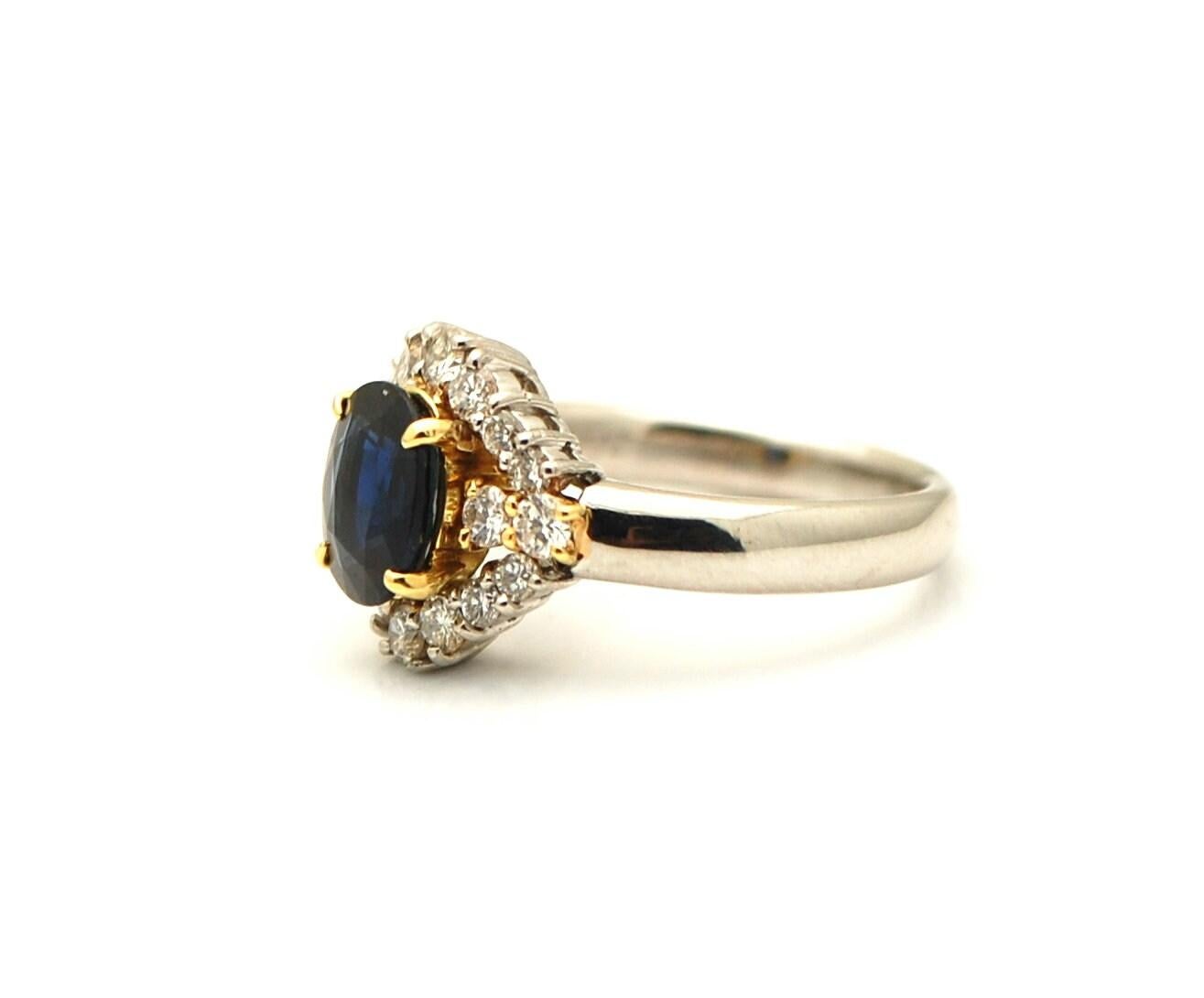 Oval Cut Deep Blue sapphire diamond ring in platinum For Sale