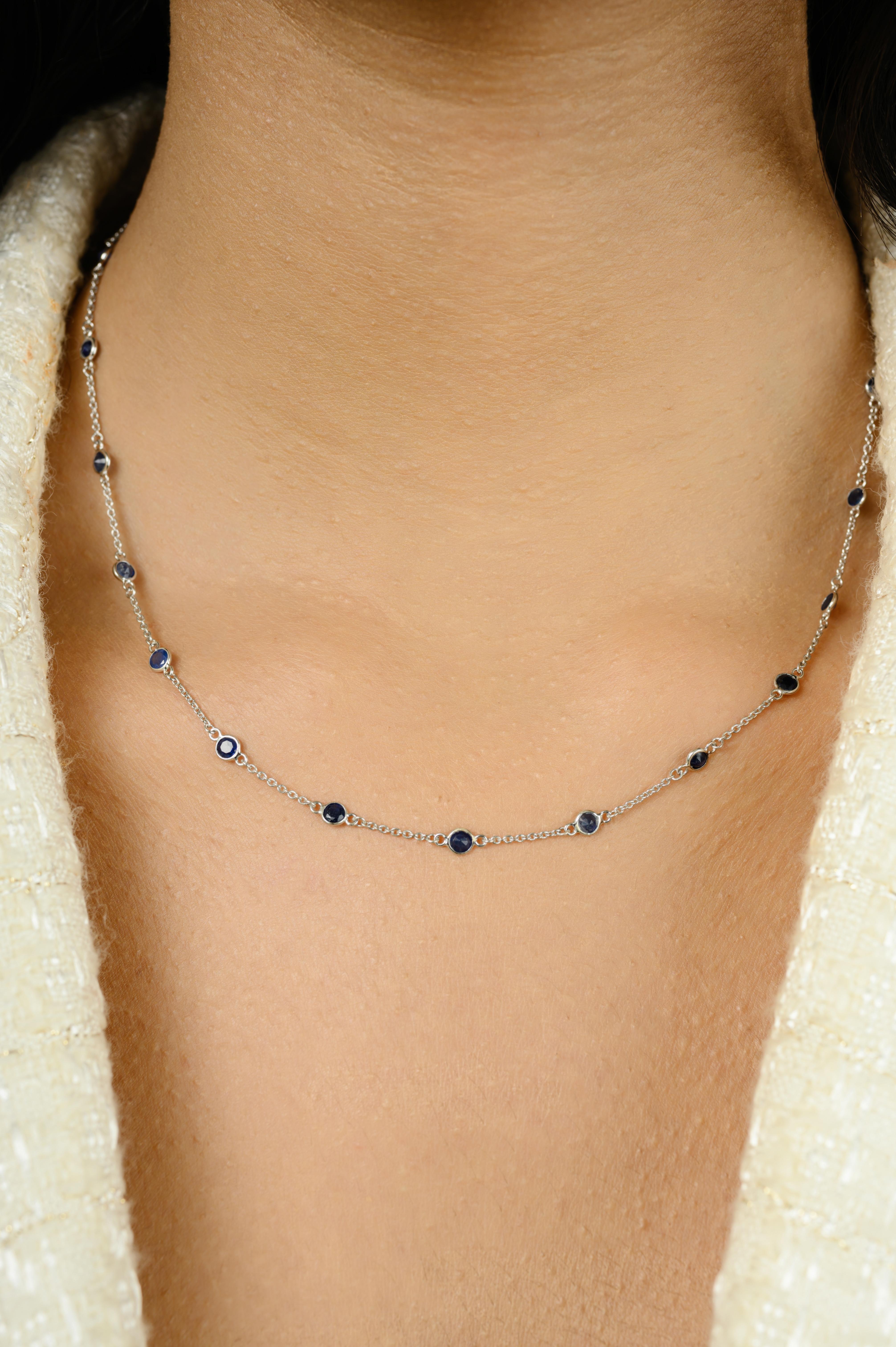 Deep Blue Sapphire Station Chain Necklace for Girlfriend in 14K Gold studded with round cut blue sapphire. This stunning piece of jewelry instantly elevates a casual look or dressy outfit. 
Sapphire stimulate concentration and reduces