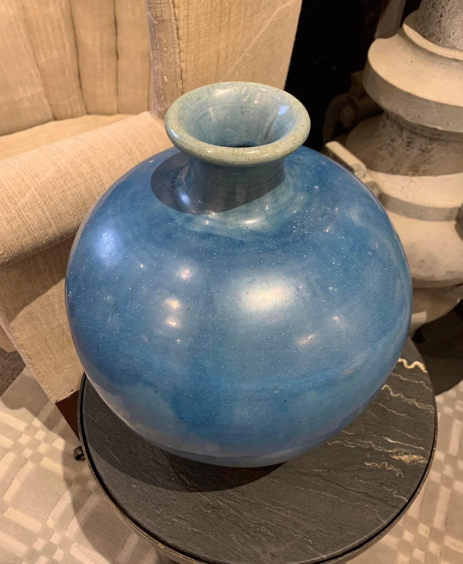 Contemporary Chinese deep blue glazed vase.
Thin spout and rounded base.

