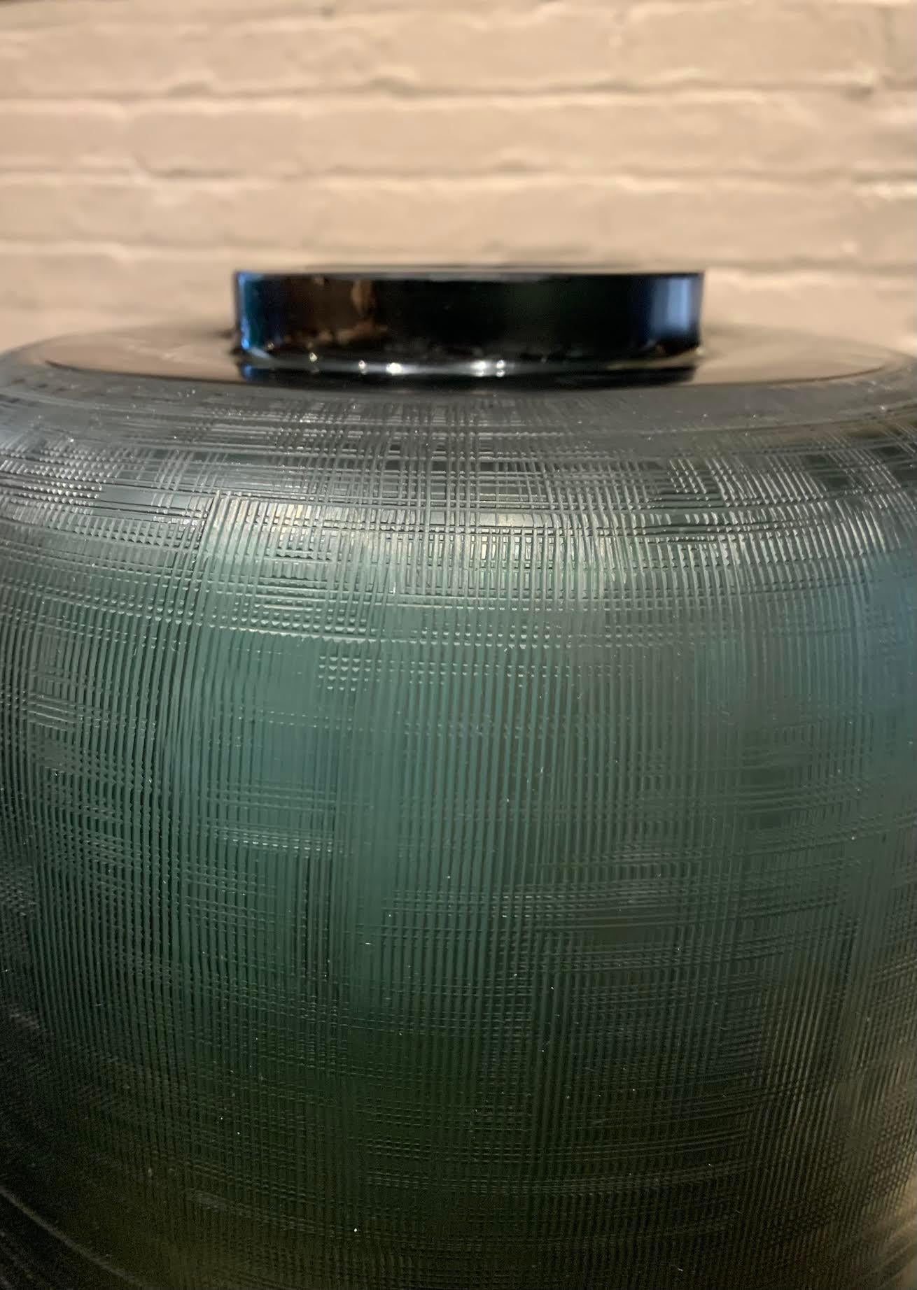 Contemporary Romanian deep blue glass vase with vertical rib decorative detail.
Can hold water.
From a collection of other deep blue glass vases and bowls (S6281 thru S6287).