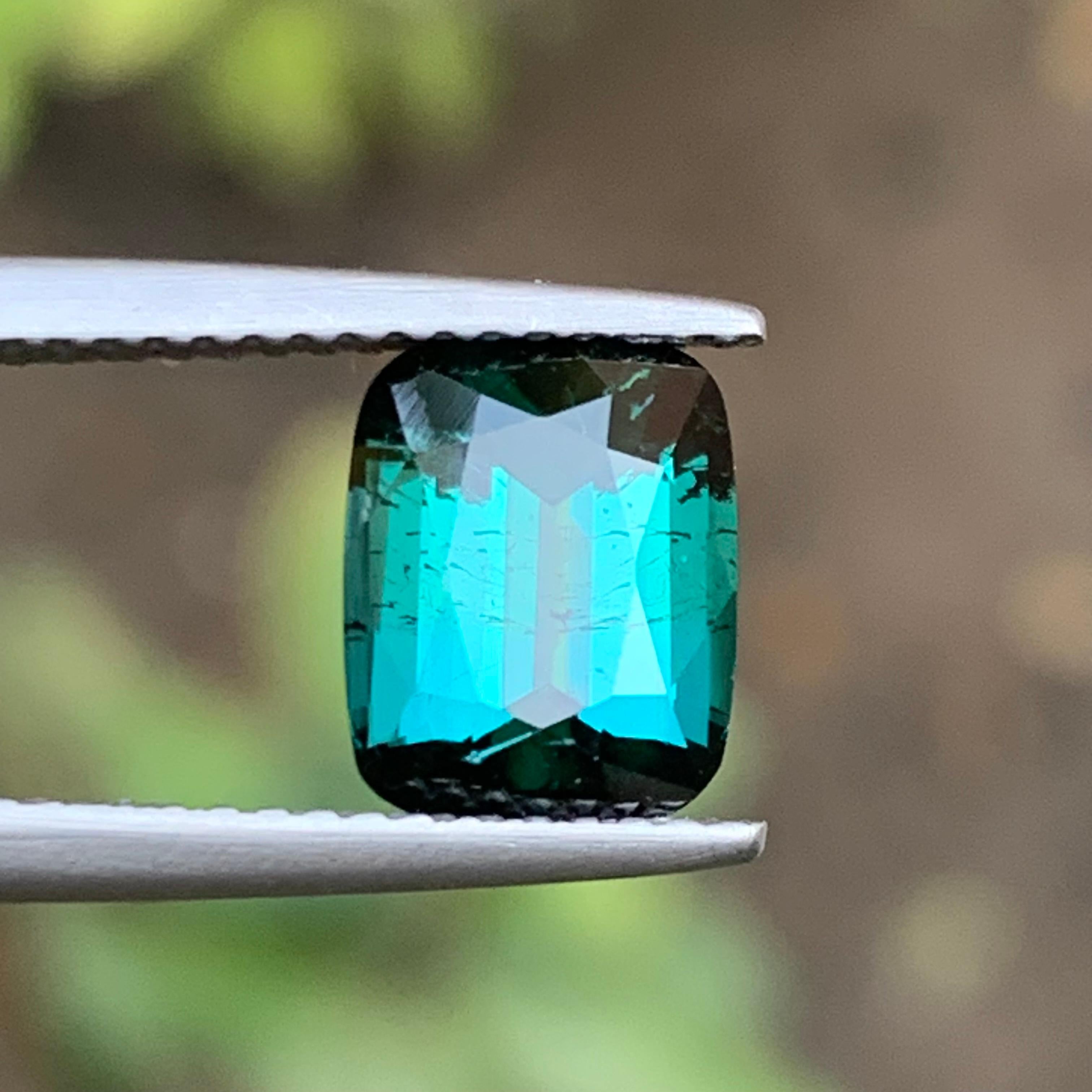 Deep Bluish Green Natural Tourmaline Loose Gemstone for Ring, or any other Jewelry Setting from Kunar Afghanistan!!

💎 GEMSTONE TYPE: Tourmaline
⚖️ WEIGHT: 2.35 Carats
🪚 SHAPE & CUT: Cushion Cut
📏 SIZE (MM): 8.95 x 7.05 x 4.90
🌈 COLOR:  Deep