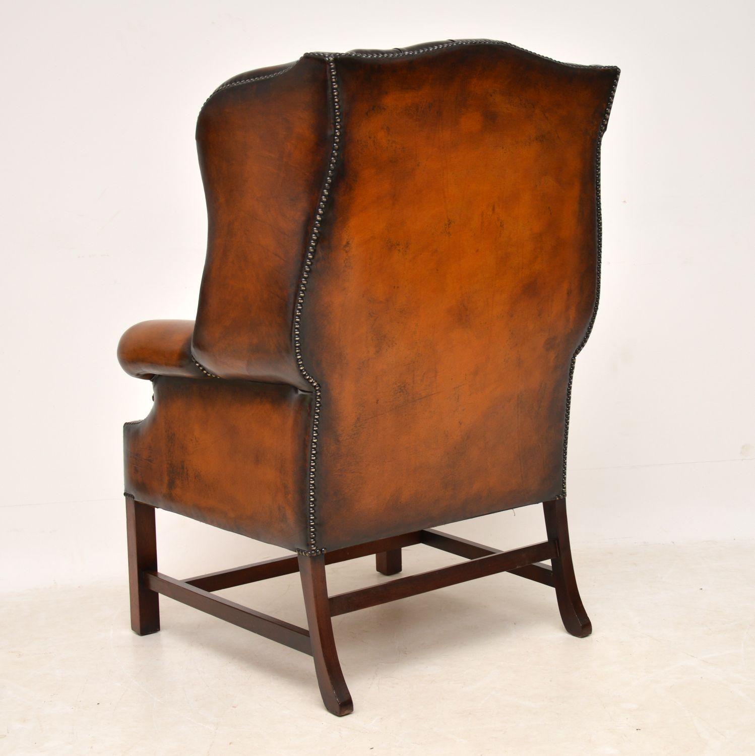 Mid-20th Century Deep Buttoned Leather Wing Back Armchair