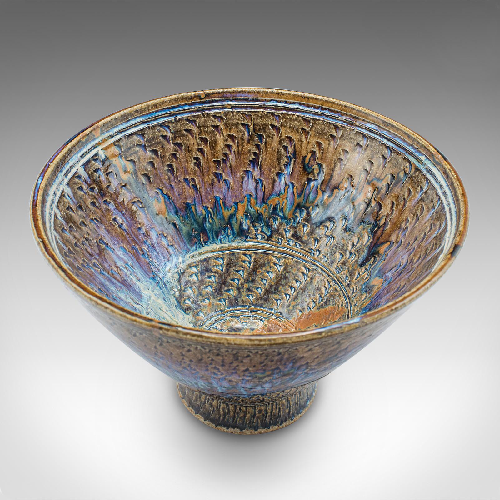 
This is a deep contemporary bonbon dish. An English, ceramic serving bowl by Leslie Parrott.

Distinctive appearance, with striking colour and a quality finish
Displays a desirable contemporary order throughout
Fascinating, glazed bowl form, deeply