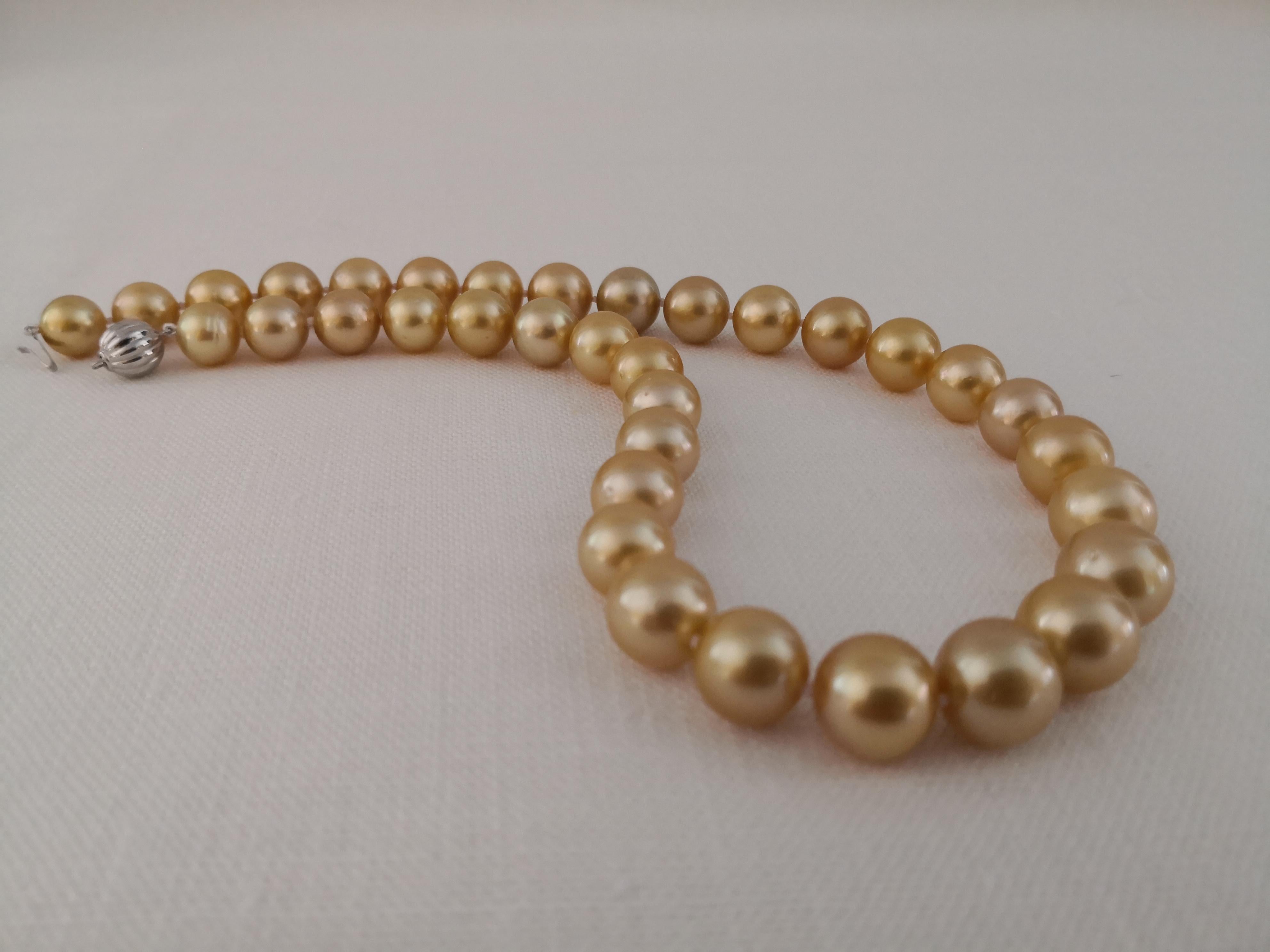 Contemporary Deep Golden Color South Sea Pearl Necklace, Round, 18 Karat Gold For Sale
