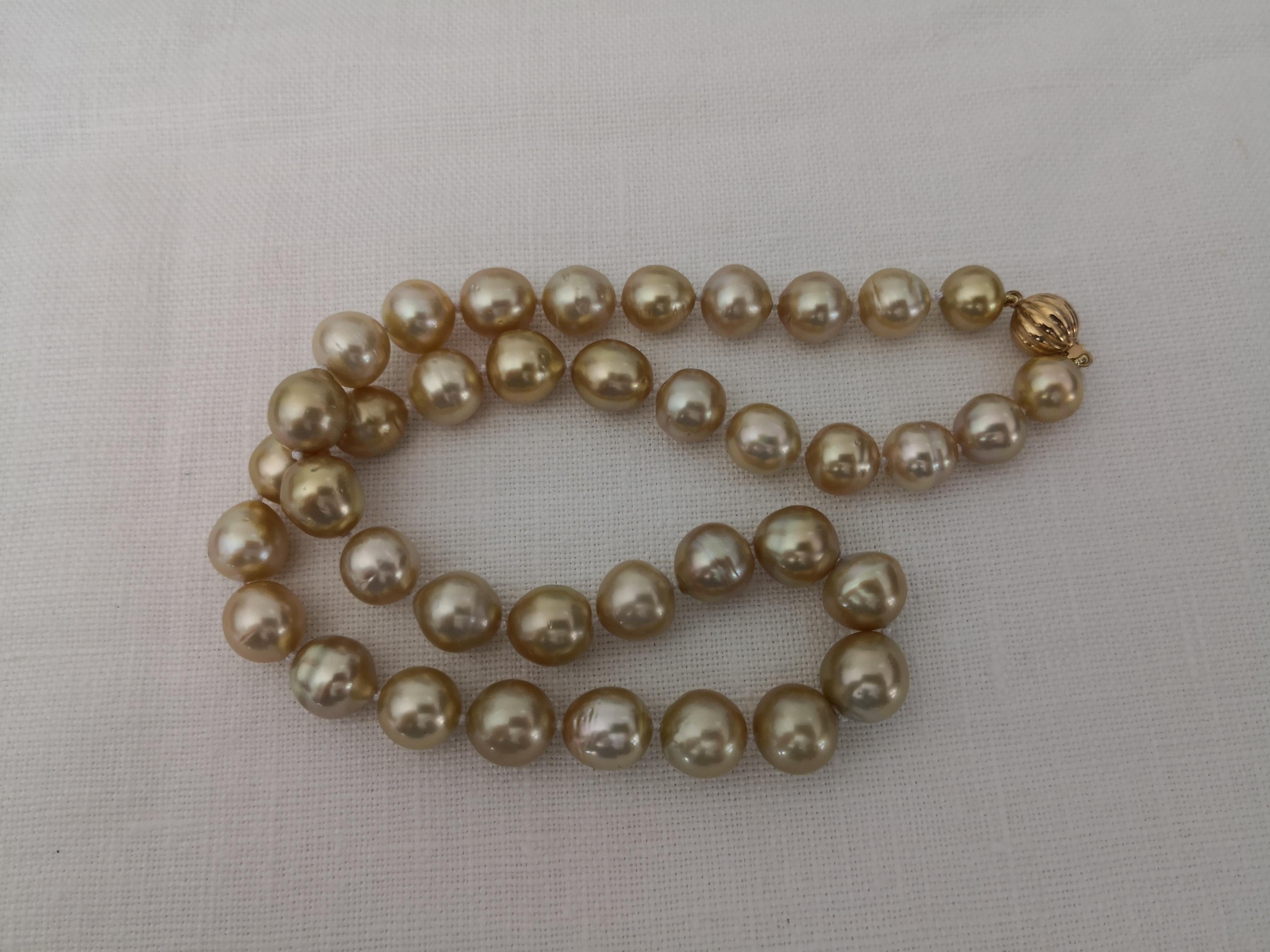 A Gorgeous Natural Color Deep Golden South Sea Pearls Necklace

- 38 pearls in the necklace

- Size of Pearls from 10 to 12 mm 

- Natural Deep Golden Color

- Natural High Luster

- Pearl of oval and drop shapes

- 45 cm long necklace