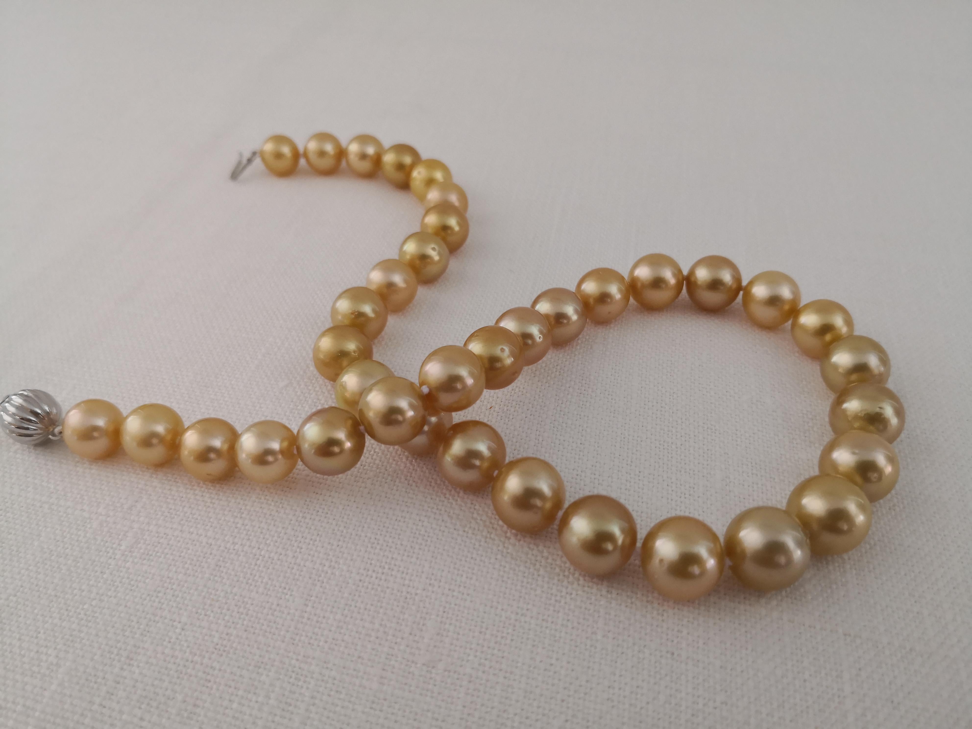 Contemporary Deep Golden Natural Color South Sea Pearls, Round, 18 Karat Gold