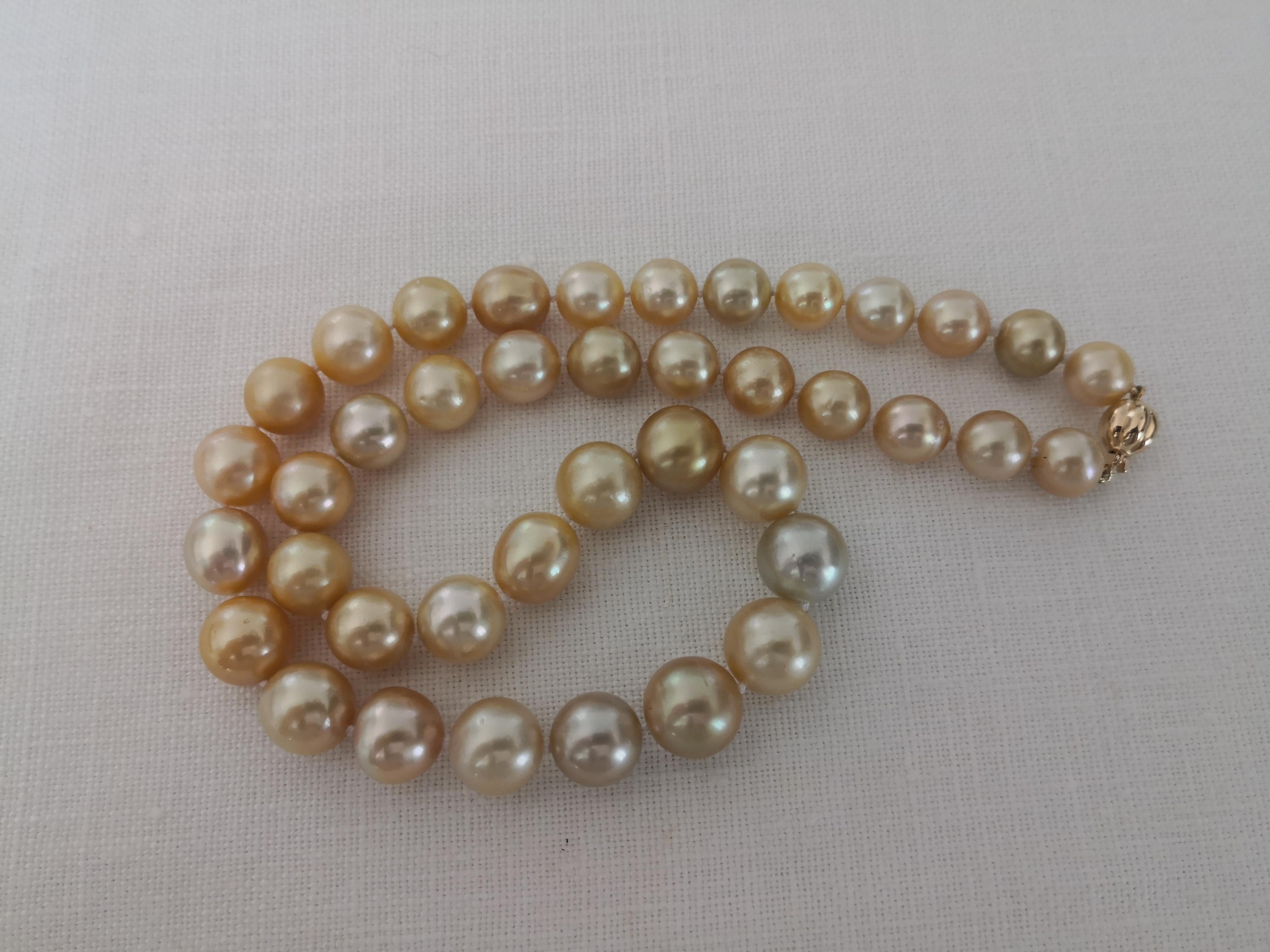 A Natural Color South Sea Pearls necklace

- Size of Pearls 10-13 mm of diameter

- Pearls from Pinctada Maxima Oyster

- Origin: Indonesia ocean waters

- Natural Golden Color pearls

- Natural luster and orient

- Pearls of Near Round shape

-