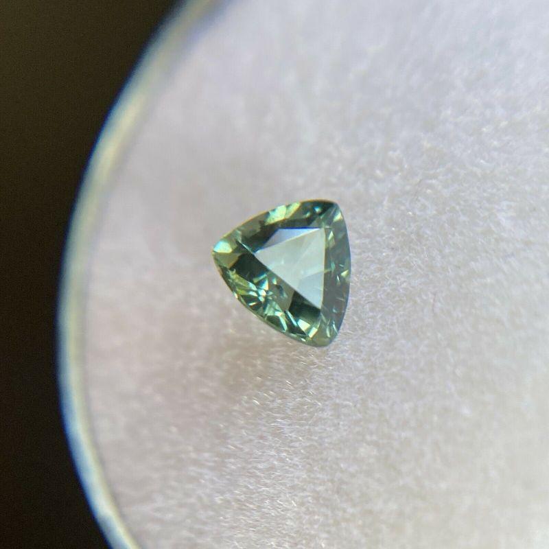 Deep Green Blue Australian Sapphire 0.67ct Trillion Triangle Cut Gem 5.2 x 5mm

Natural Deep Green Blue Australian Sapphire Gemstone. 
0.67 Carat with a beautiful deep greenish blue colour and very good clarity, a clean stone with only some small