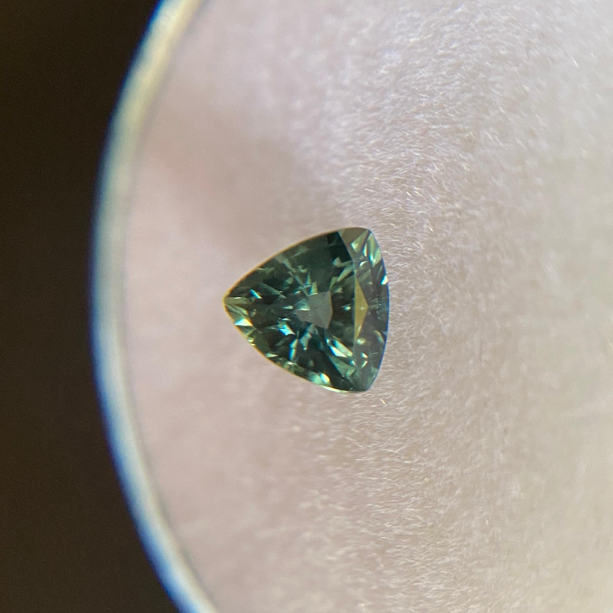 Natural Deep Green Blue Australian Sapphire Gemstone.

0.67 Carat with a beautiful deep greenish blue colour and very good clarity, a clean stone with only some small natural inclusions visible when looking closely. No breaks or cracks.

Also has an