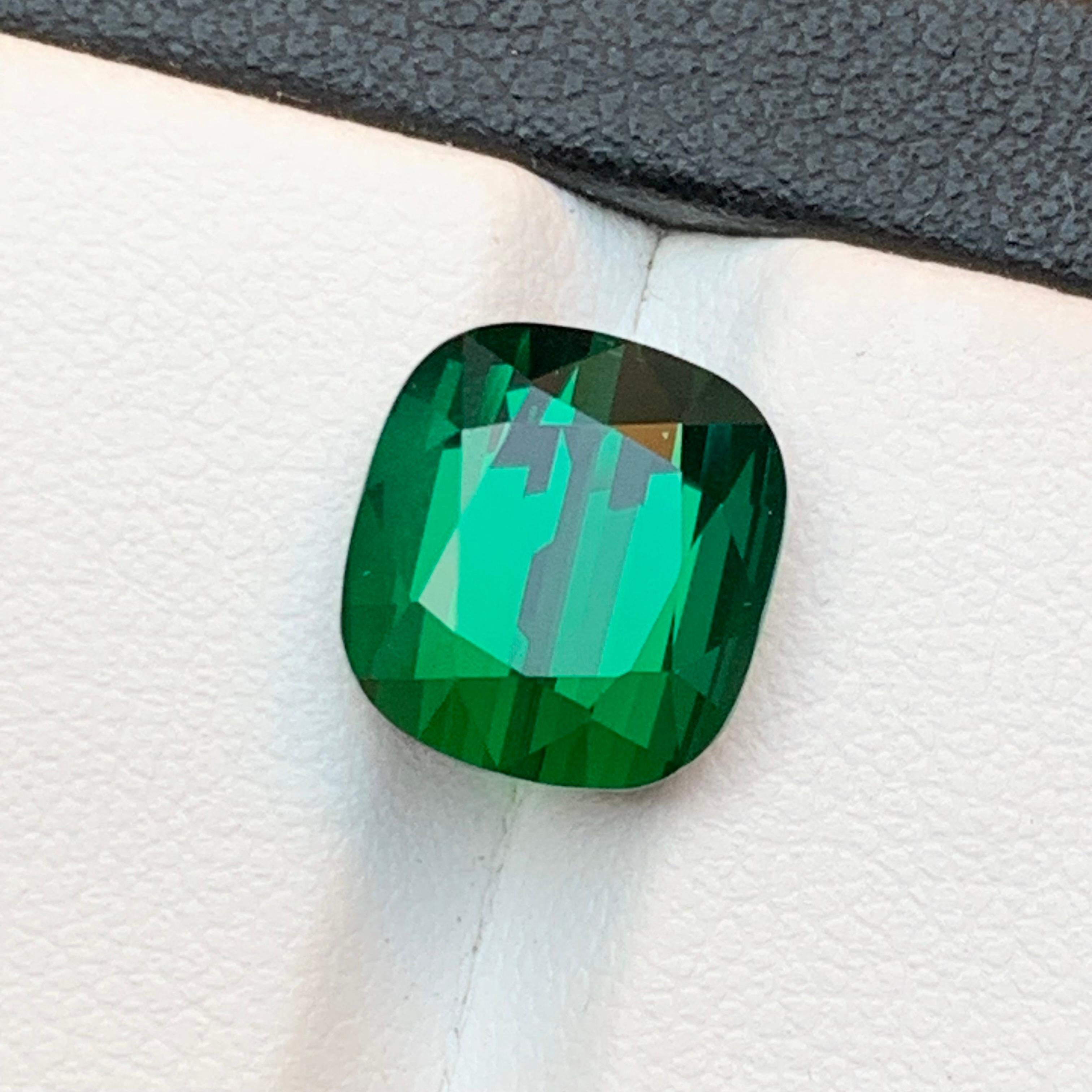 Deep Green Bluish Hue Natural Tourmaline Loose Gemstone for Ring, or any other Jewelry Setting- Cushion Cut!!

💎 GEMSTONE TYPE: Tourmaline 
⚖️ WEIGHT: 5.90 Carats 
🪚 SHAPE & CUT: Cushion Cut
📏 SIZE (MM): 10.23 x 9.46 x 7.25
🌈 COLOR: Deep Green