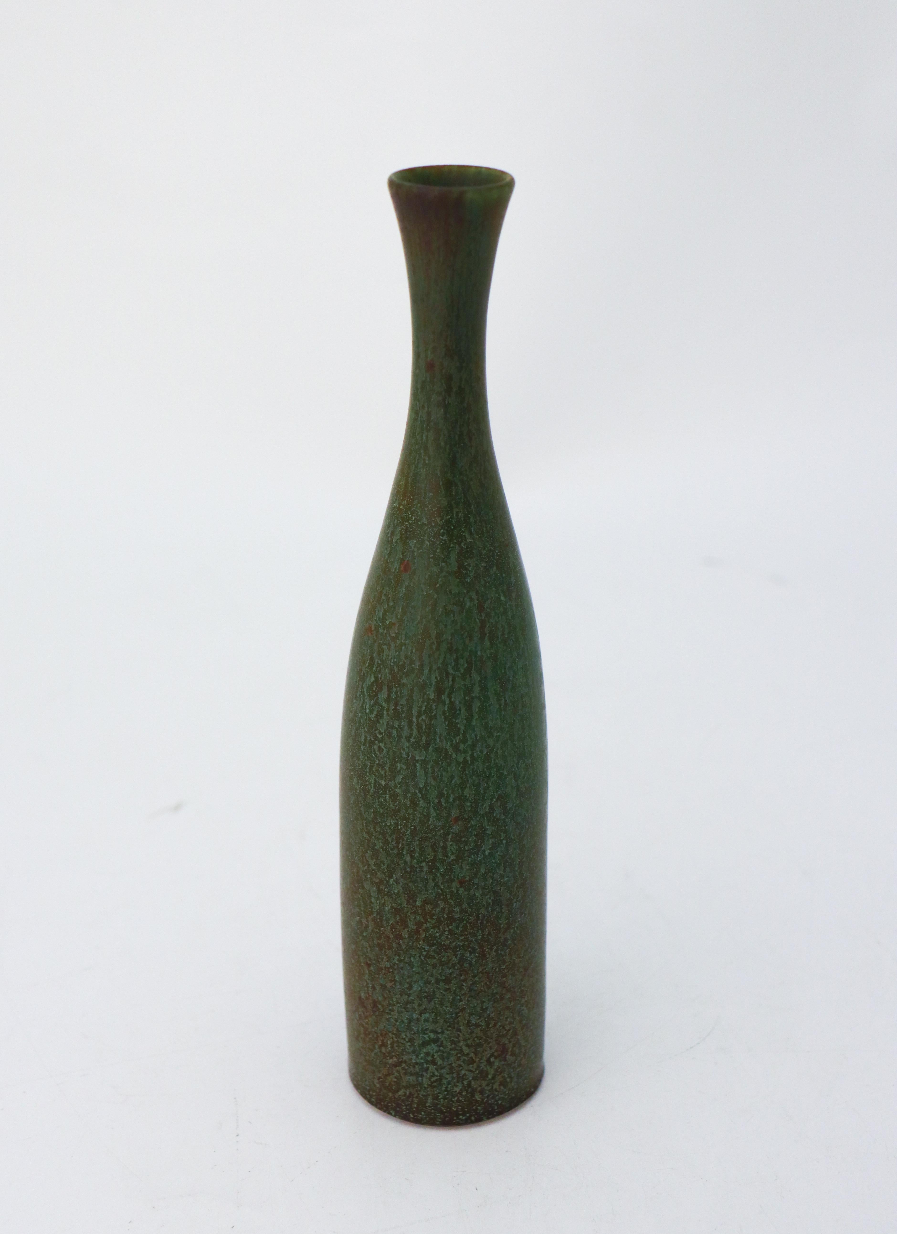 A deep green vase designed by Carl-Harry Stålhane at Rörstrand. The vase is 22 cm (8.8