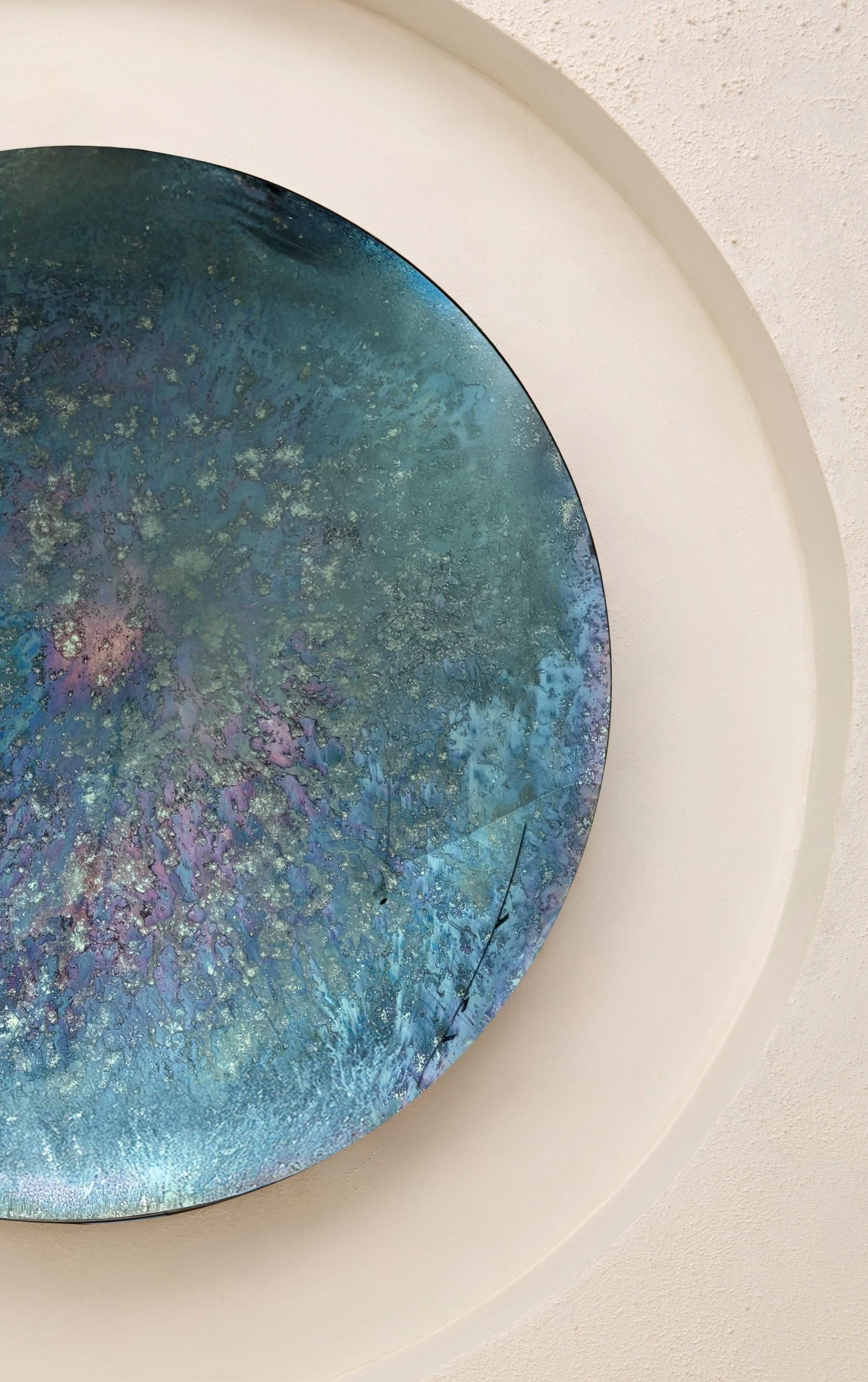Convex Mixed Technique Mirror.
Ø97 cm  Depth: 7 cm  Thickness: 4 mm 
Colour: Multicolor  Hanger: Brass

HOMA's convex mirrors merges antique mirroring
techniques with modern aesthetics. Through experiments with the chemistry of the mirroring