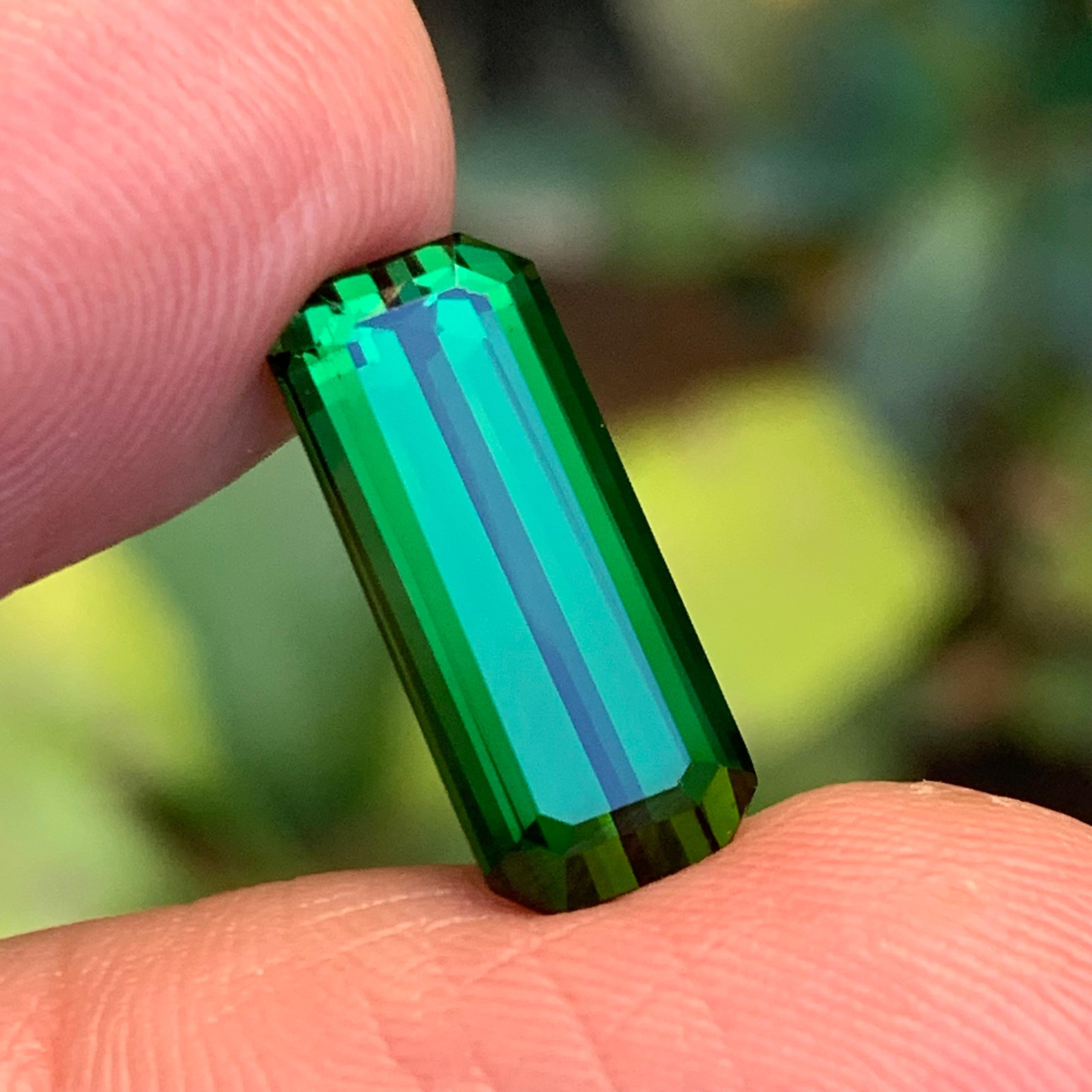 Unearth the allure of our Deep Green Natural Tourmaline, a stunning loose gemstone in an emerald cut, weighing a substantial 6.25 Carat. Originating from the prized mines of Afghanistan, this gem exhibits a rich, deep green hue that captivates the