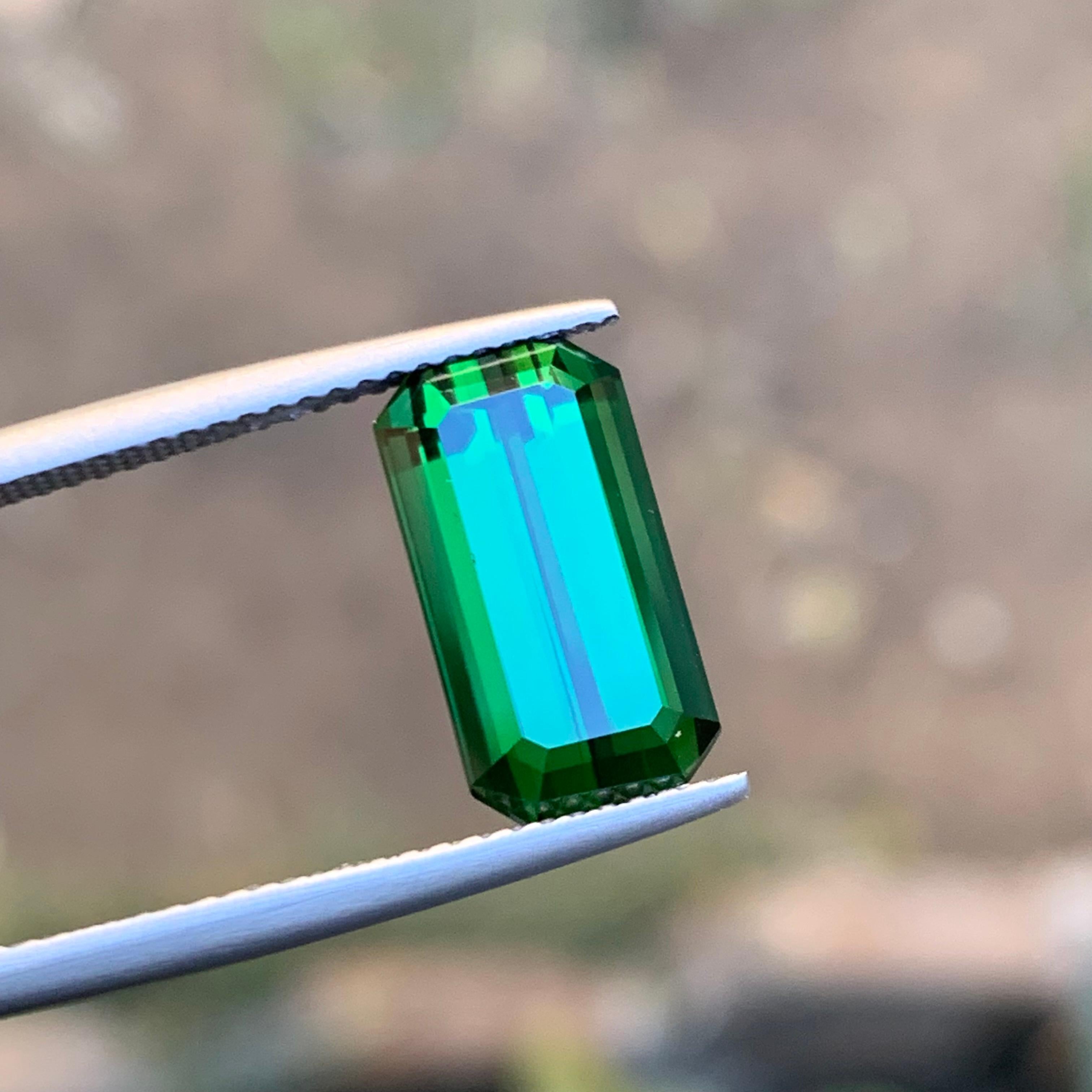 Elevate your jewelry collection with this exquisite deep green emerald-cut natural Tourmaline gemstone from Kunar, Afghanistan. Renowned for its excellent luster and eye-clean clarity, this gem is perfect for crafting timeless pieces for a precious