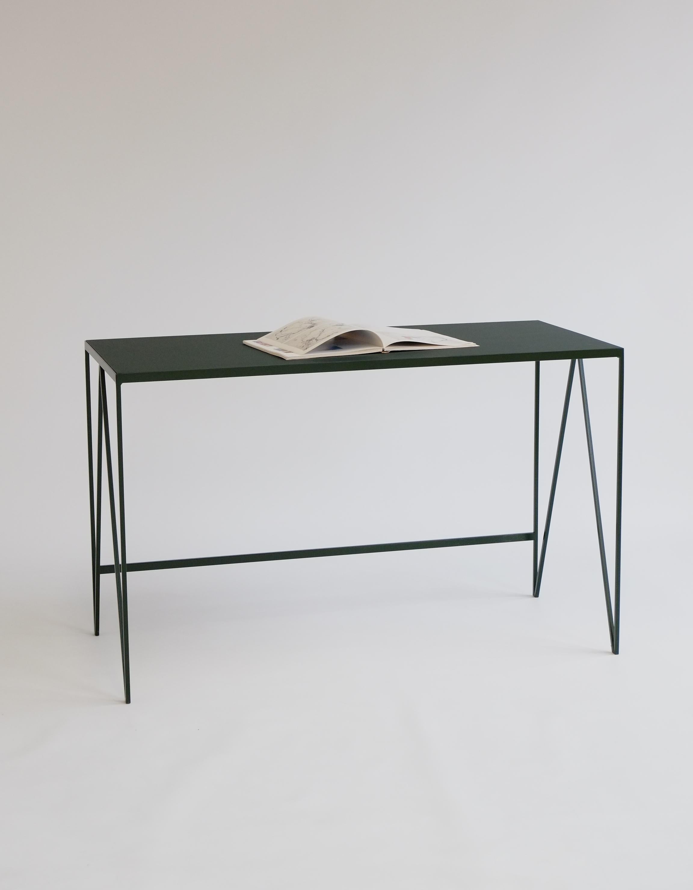 The &New Study desk is made with a deep green powder-coated steel frame and a color-matched natural linoleum tabletop. The linoleum for our desks is selected for the ecological properties of the linseed of which it is made. It also has a smooth and