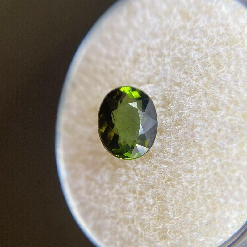 Deep Green Tourmaline 1.18ct Oval Cut Loose Gemstone 7.2 x 5.8mm

Natural Deep Green Tourmaline Gemstone. 
1.18 Carat with a beautiful deep green colour and very good clarity, some small natural inclusions visible when looking closely. No breaks or