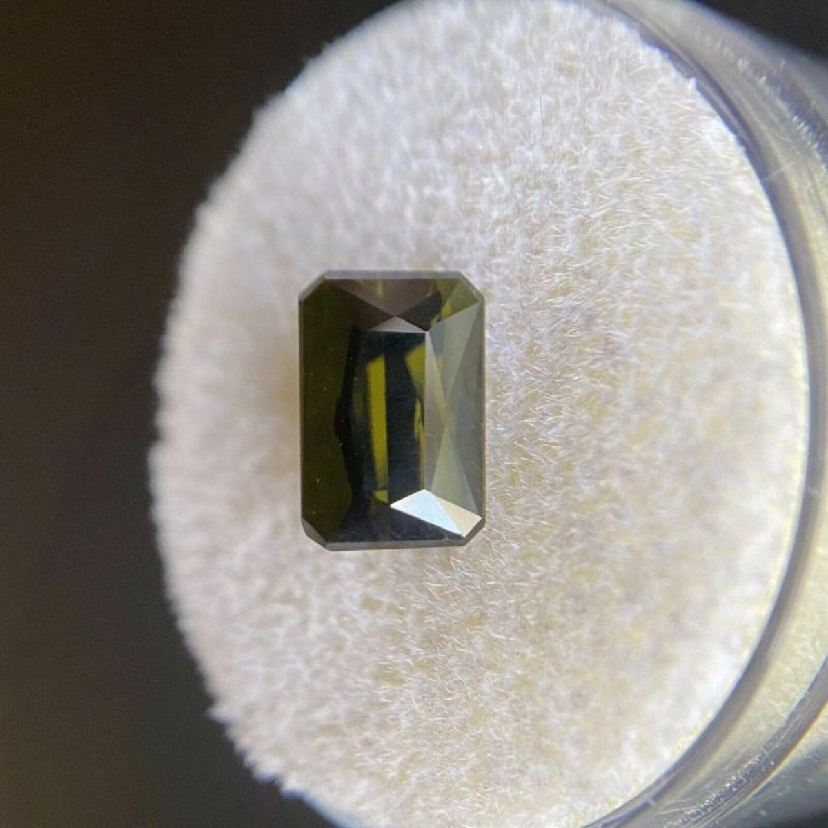 Deep Green Tourmaline 2.43ct Octagon Emerald Cut Loose Gem 9 x 6mm

Natural Deep Green Tourmaline Gemstone. 
2.43 Carat with a beautiful deep green colour and excellent clarity. Very clean stone with only some small natural inclusions visible when