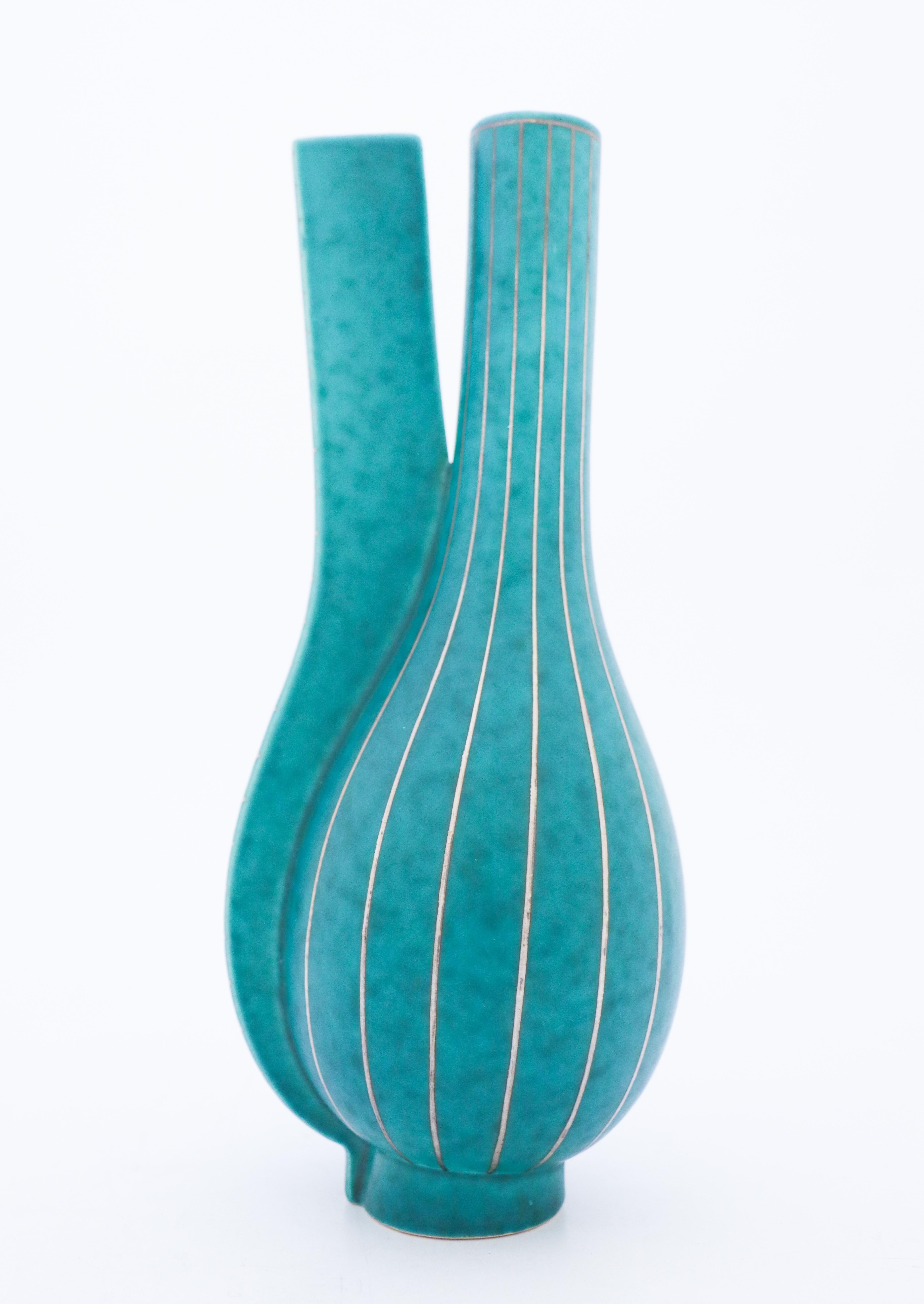 A very rare double vase of model Argenta / Surrea, designed by Wilhelm Kåge at Gustavsberg. The vase is green with a silver decor.